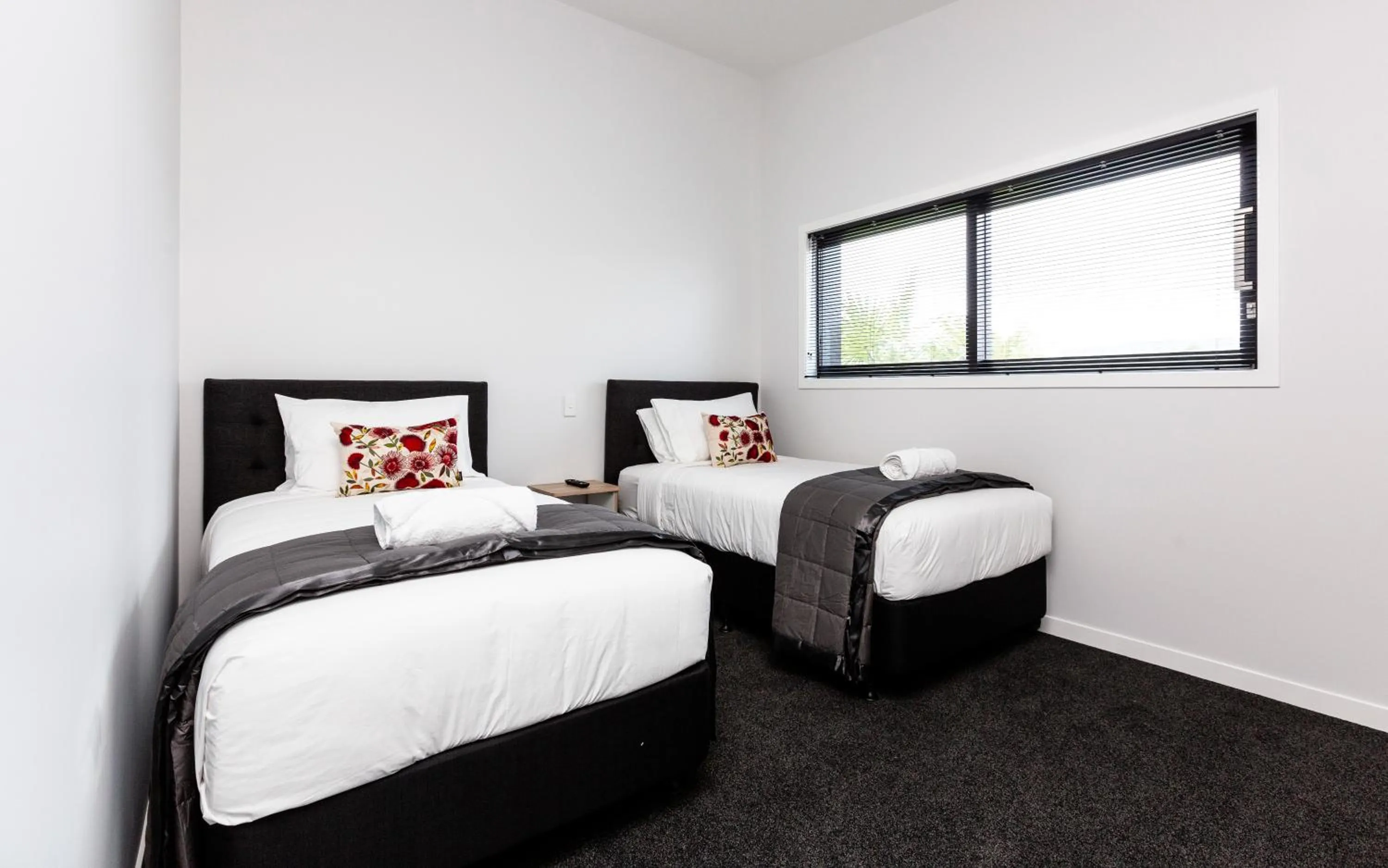 Bed in Zachary's Motel