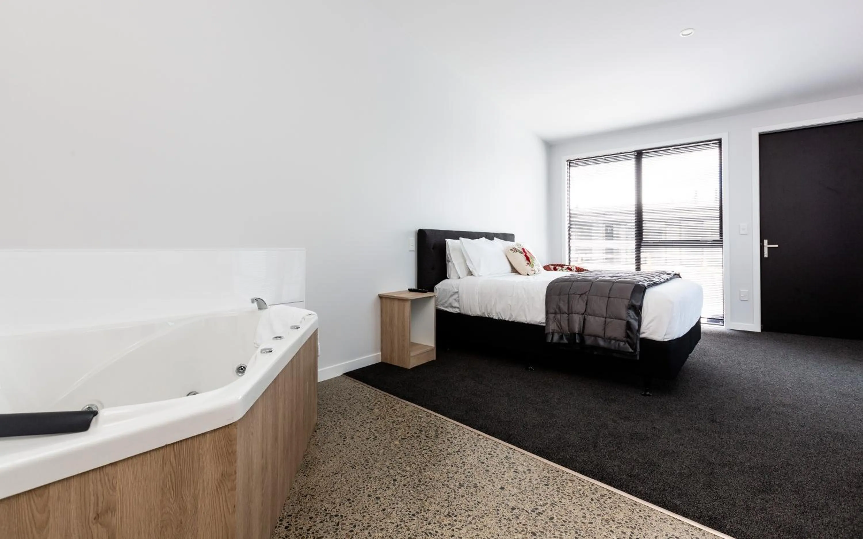 Bed in Zachary's Motel