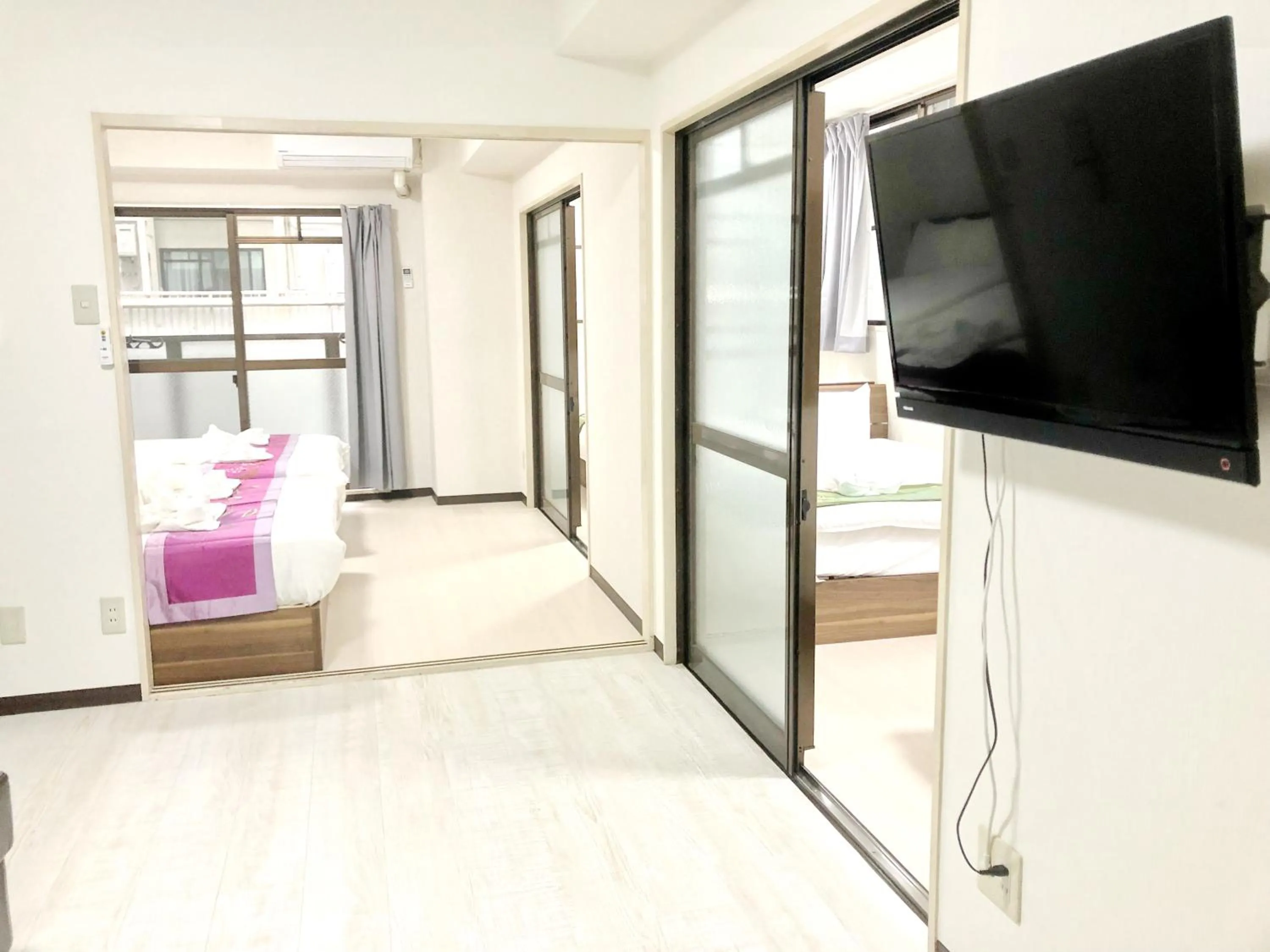 Living room, Bed in Court Saiwaicho