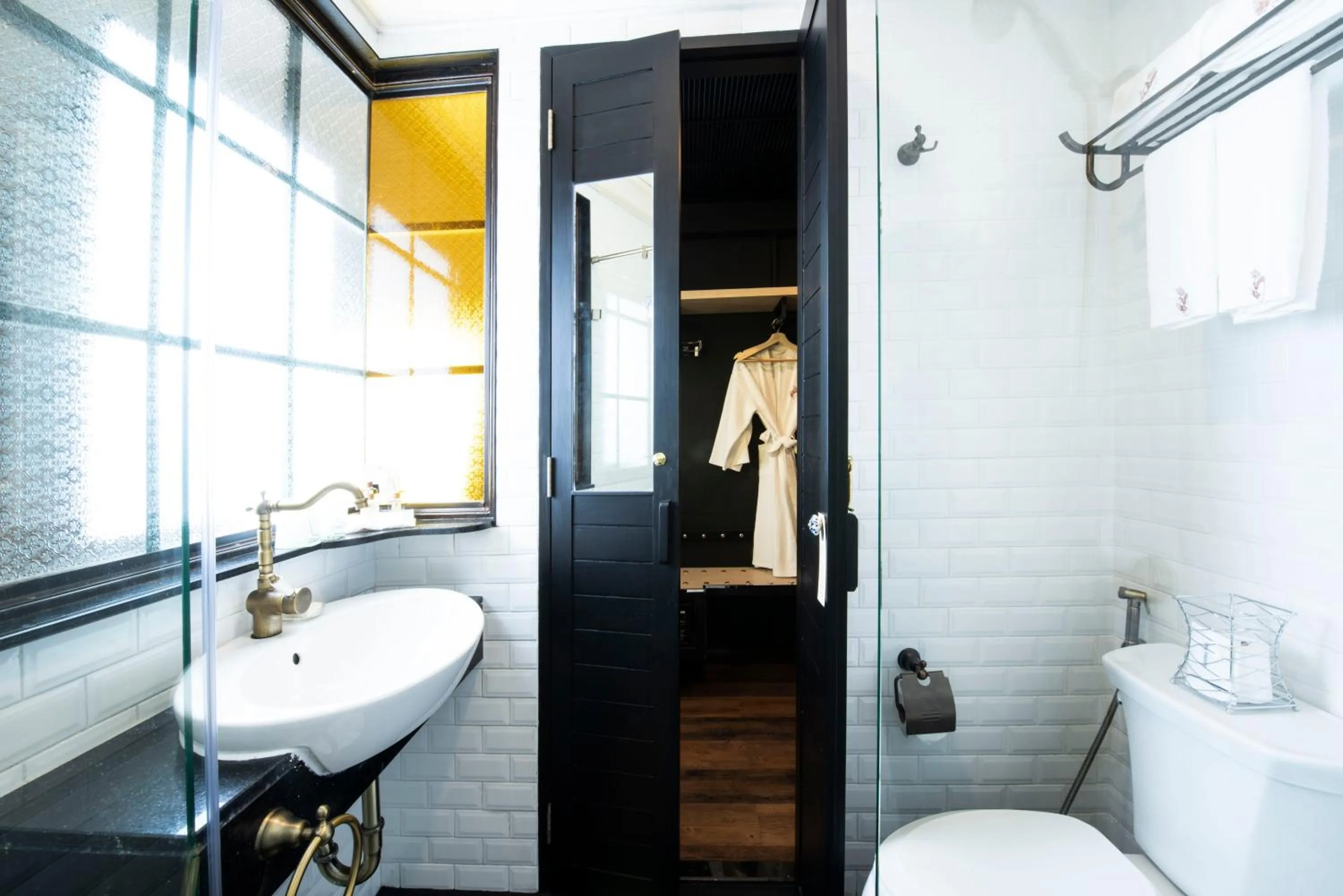 Bathroom in Dhevi Bangkok Hotel