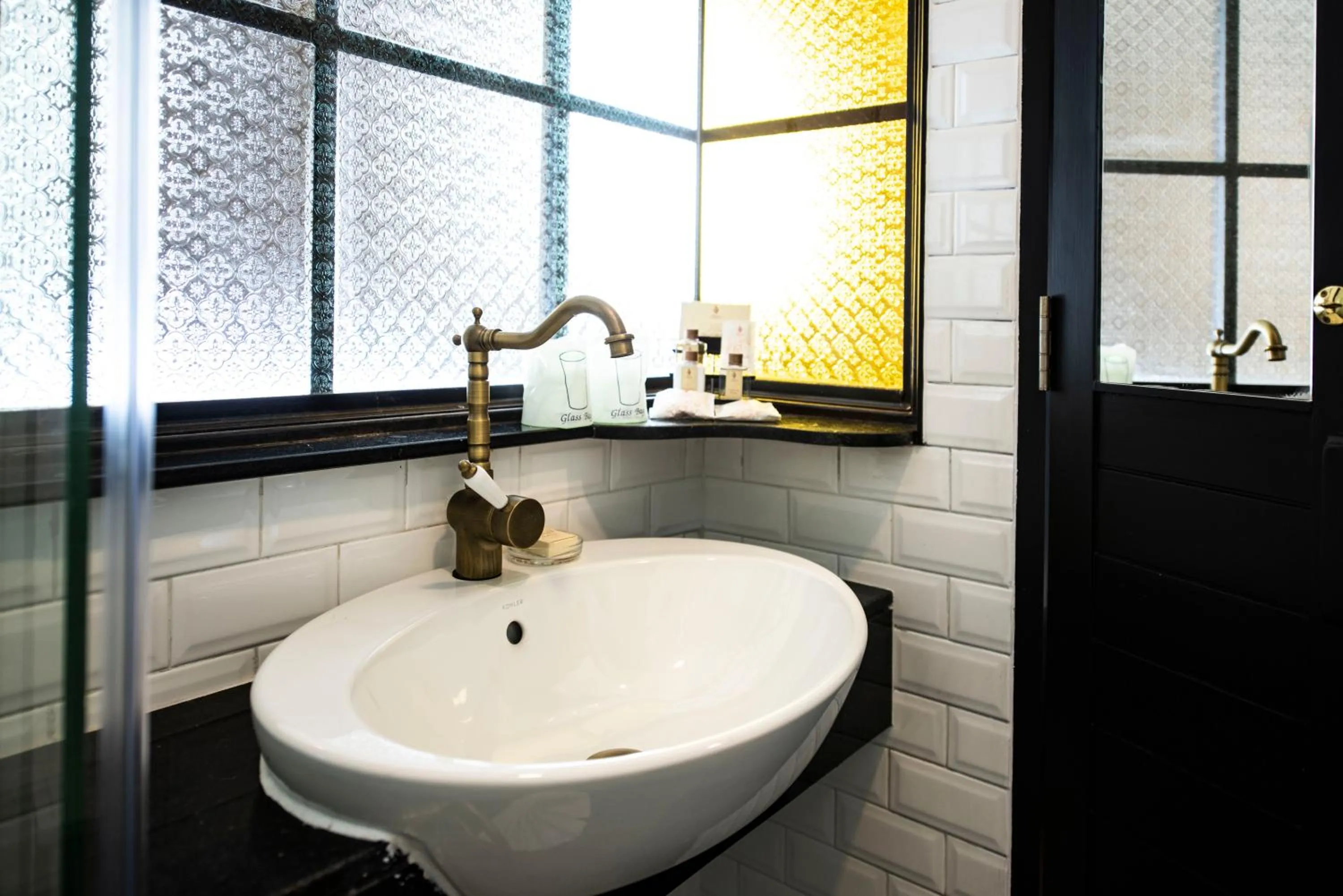 Bathroom in Dhevi Bangkok Hotel