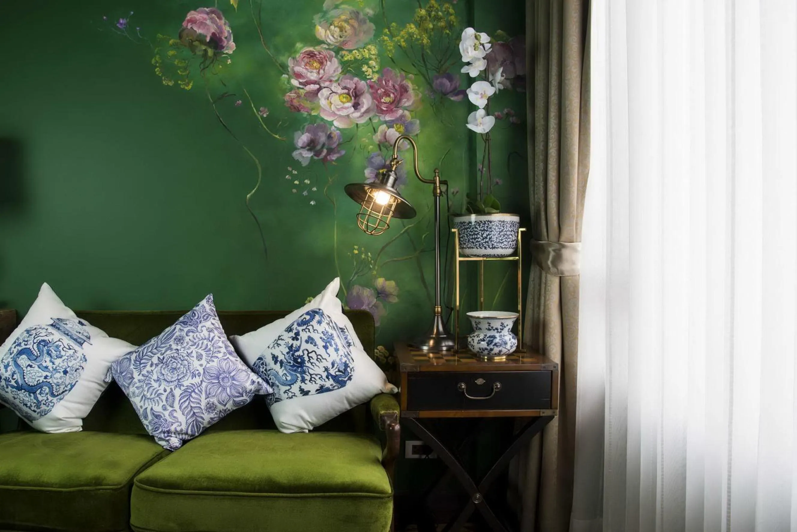 Living room in Dhevi Bangkok Hotel