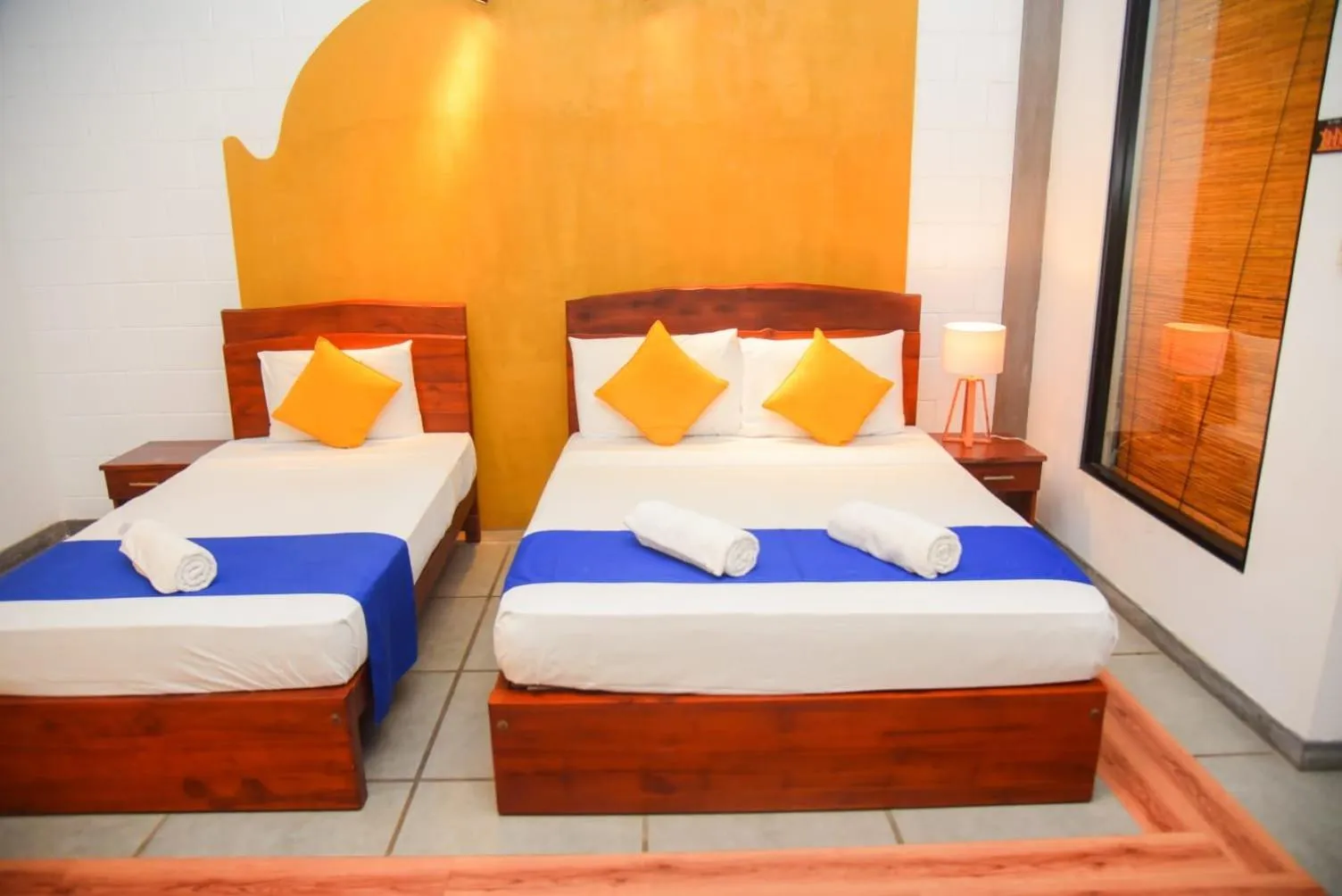 Bed in Royal Tusker Hotel