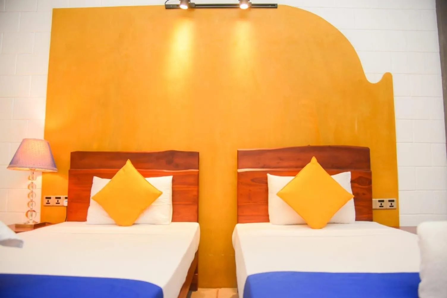 Bed in Royal Tusker Hotel