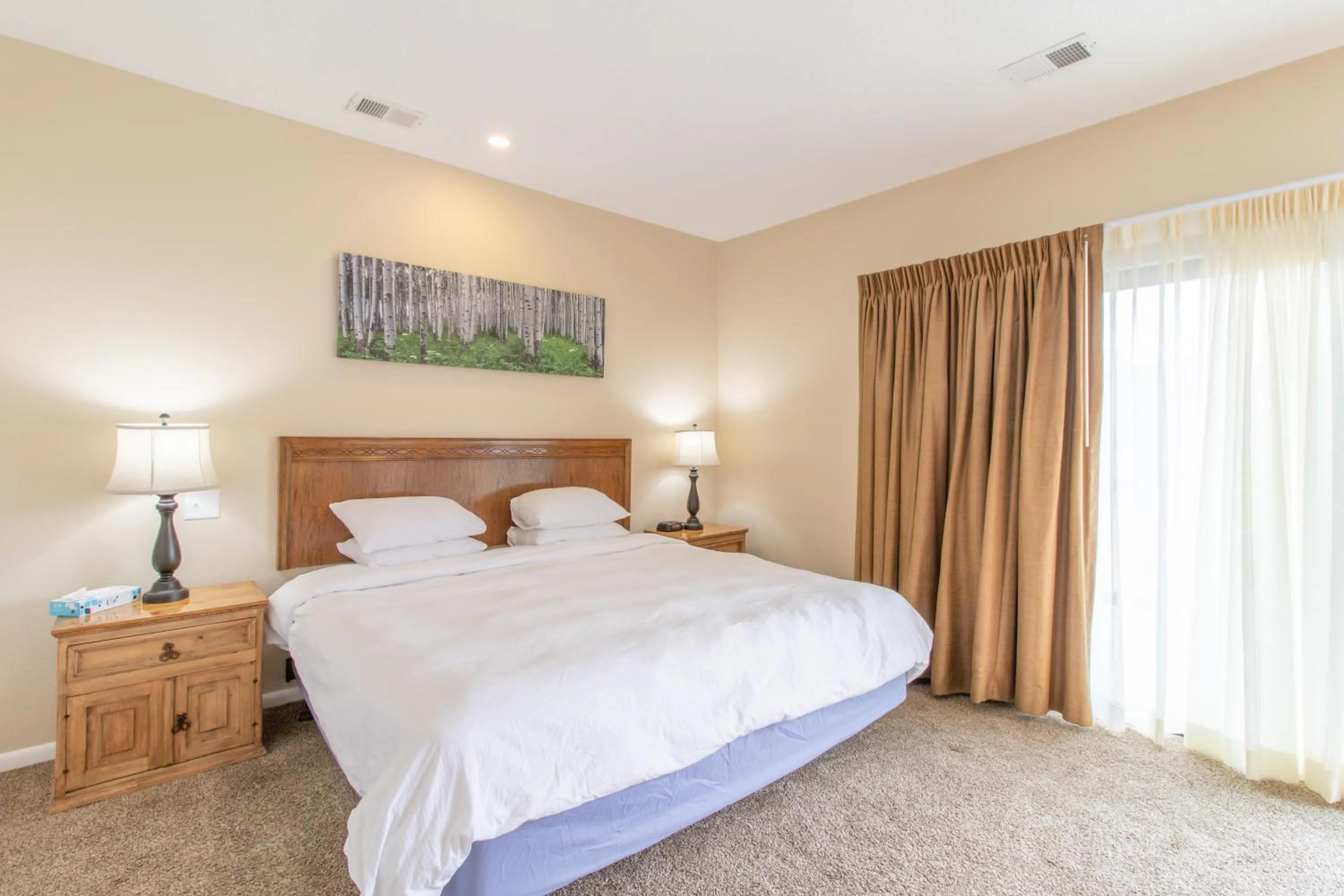 Bed in Coyote Mountain Lodge