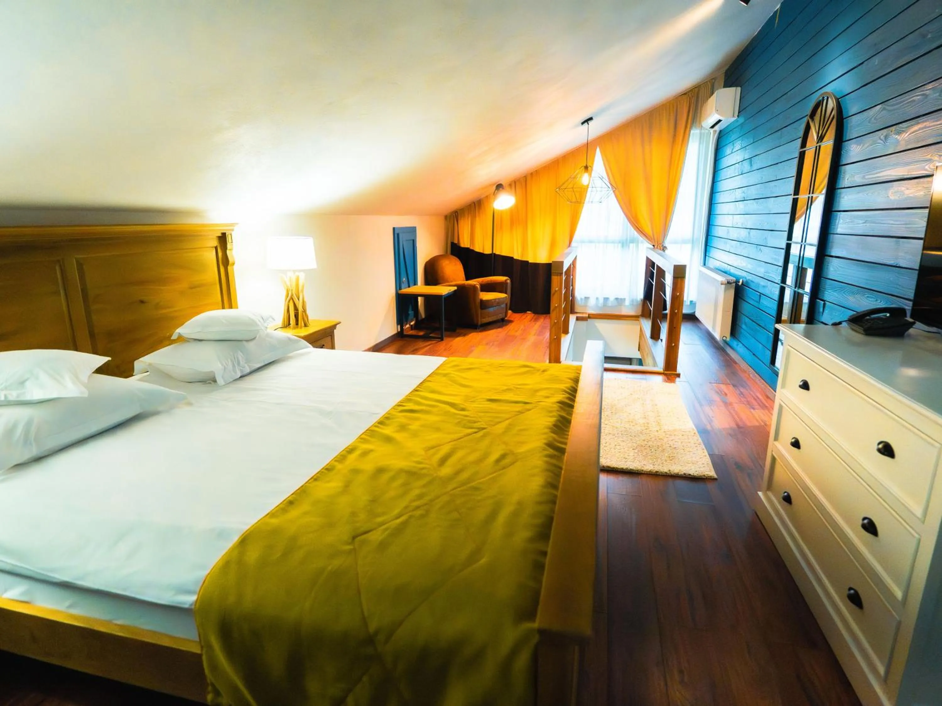 Photo of the whole room, Bed in KABAN BOUTIQUE HOTEL - 5Star Central Villa in Vatra Dornei