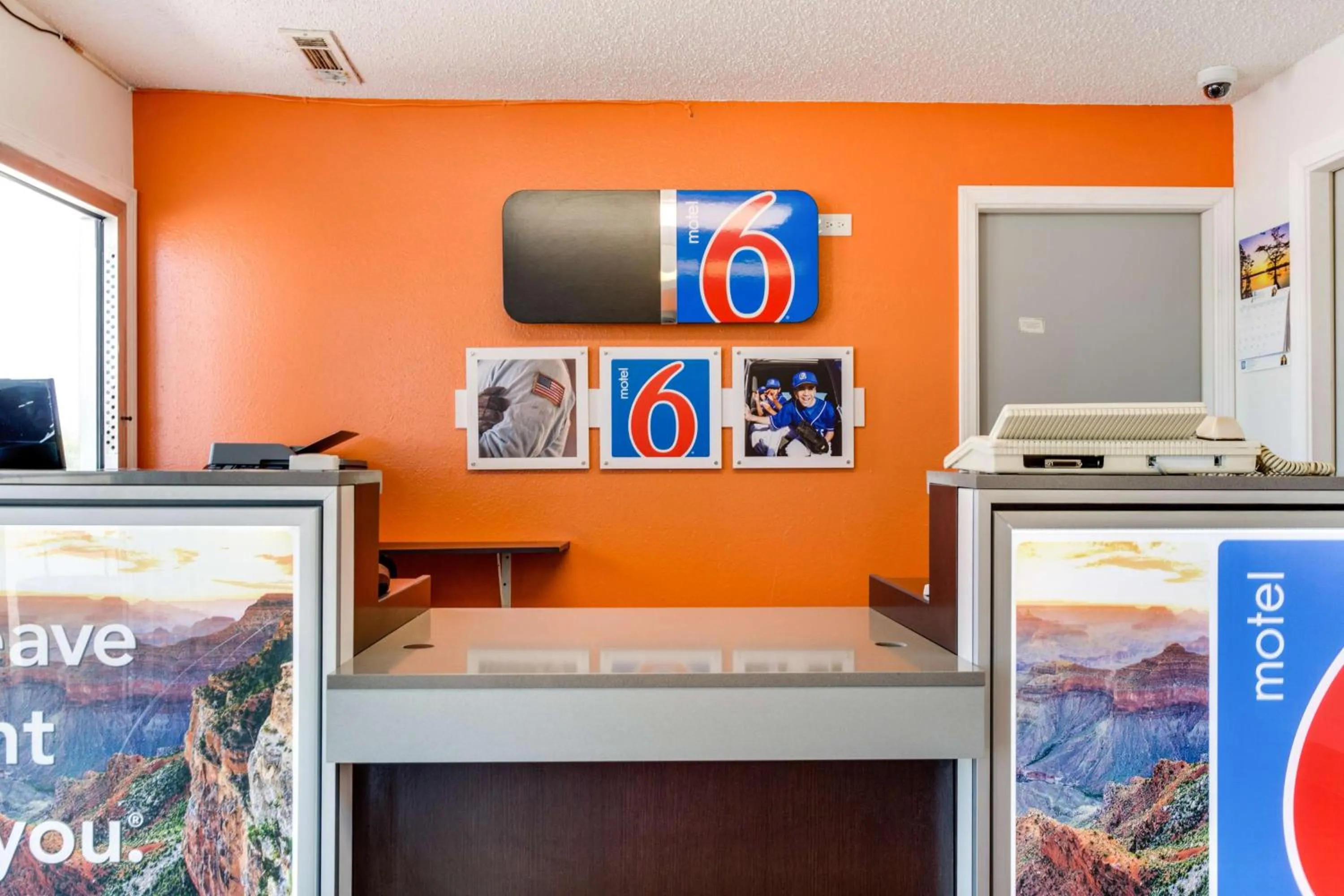 Property logo or sign in Motel 6-Fayetteville, AR