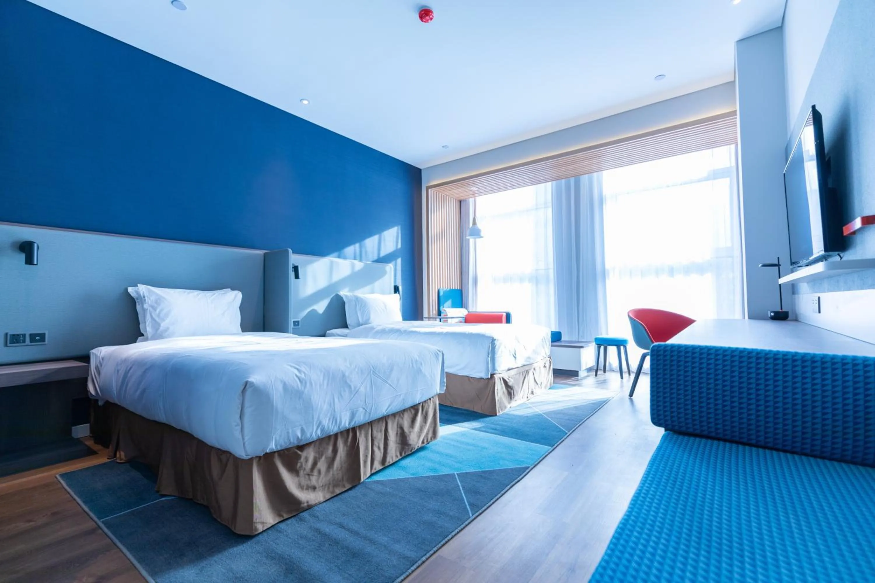 Photo of the whole room, Bed in Holiday Inn Express Harbin Qunli by IHG