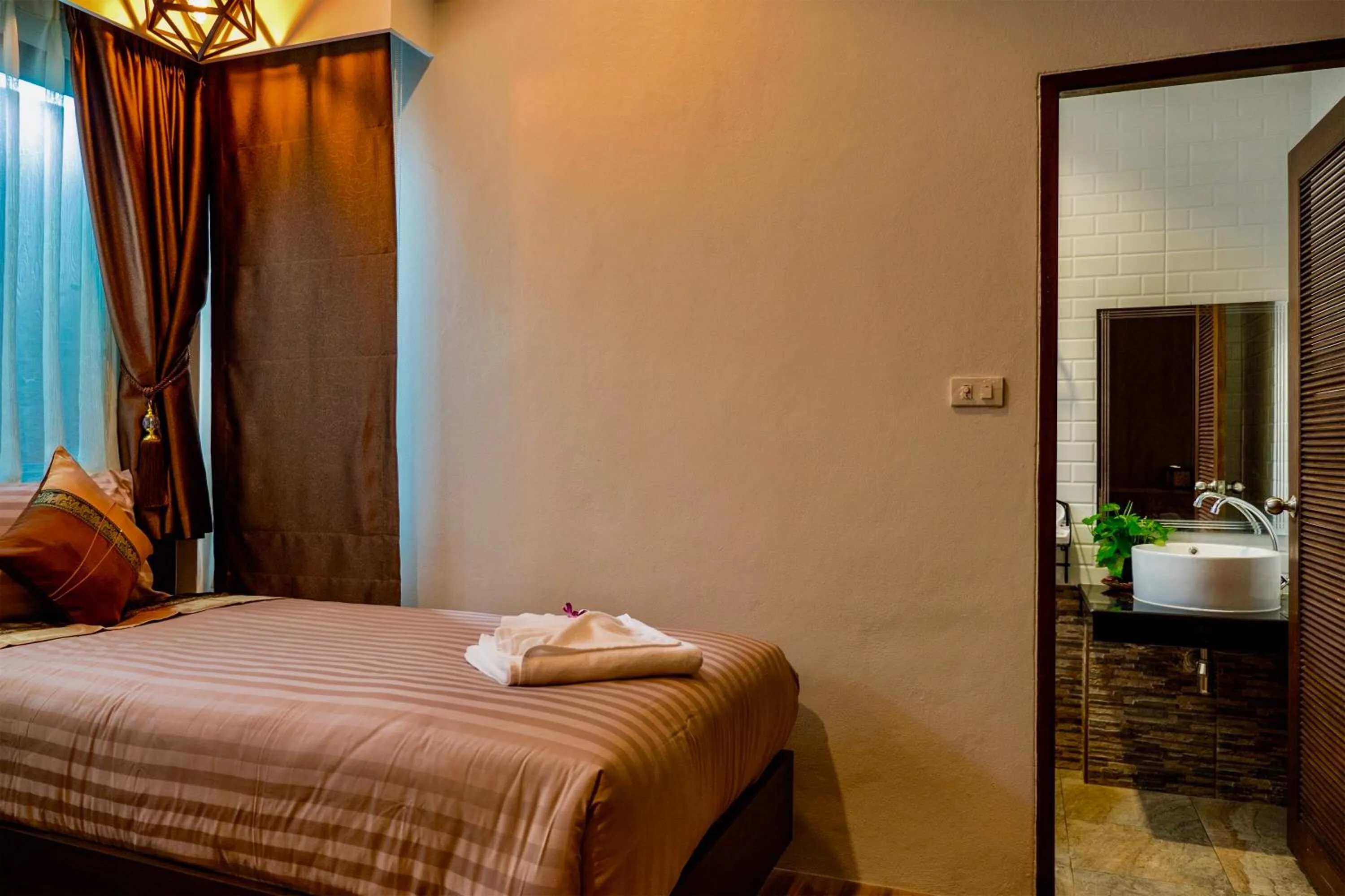 Bed in KG Private Pool Villas Soi 9