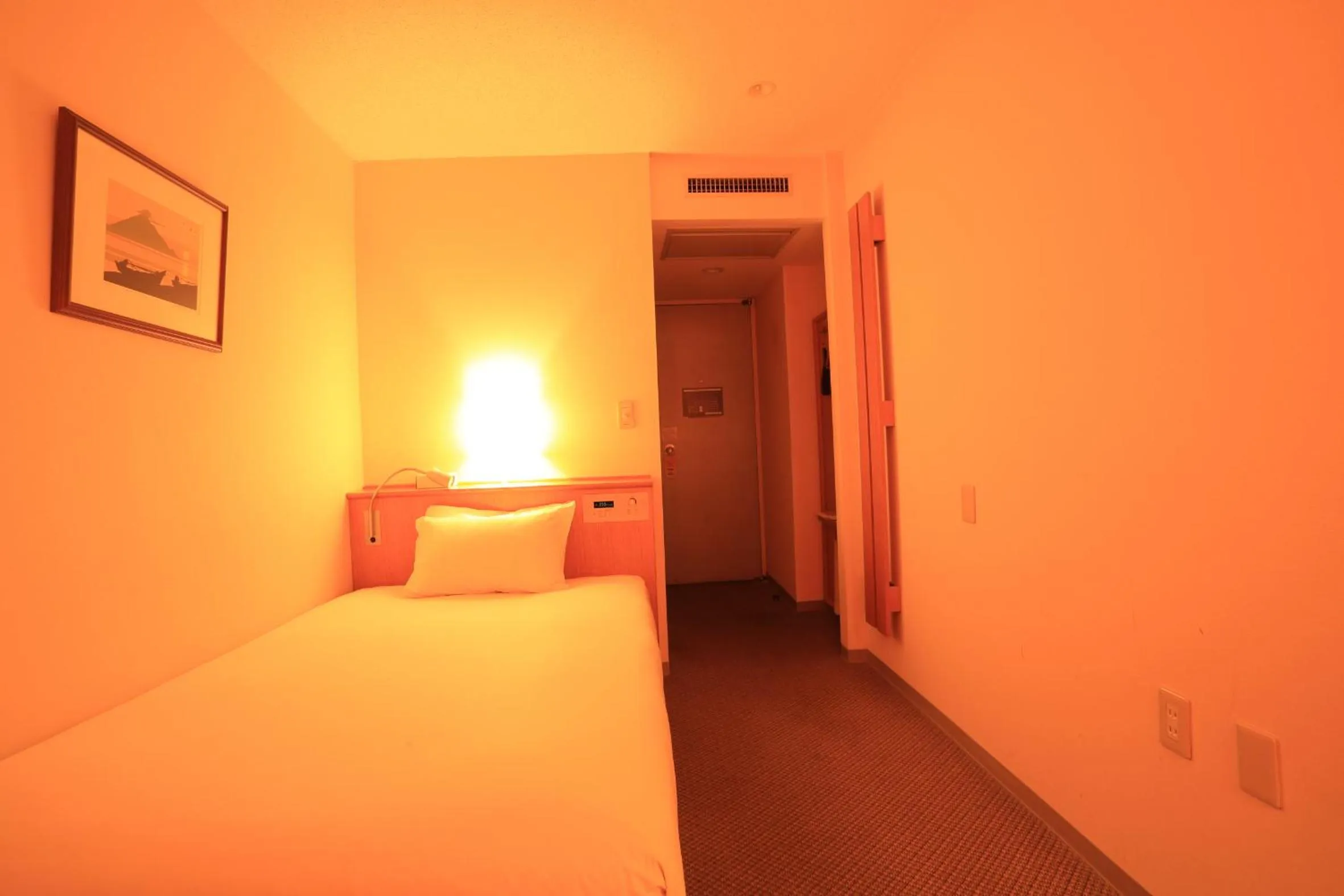 Bed in Smile Hotel Tomakomai