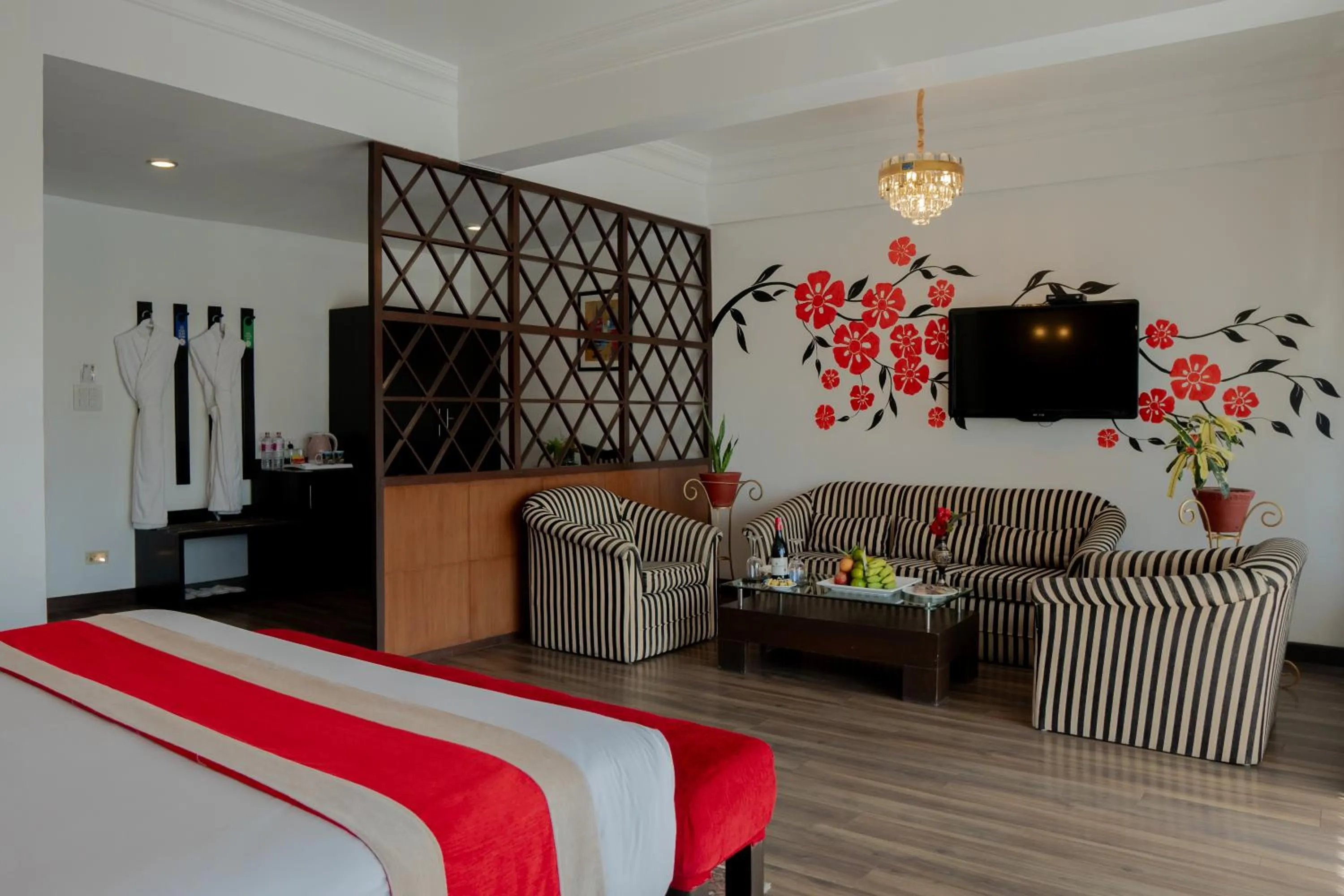 Living room, Bed in Waterfront Resort by KGH Group