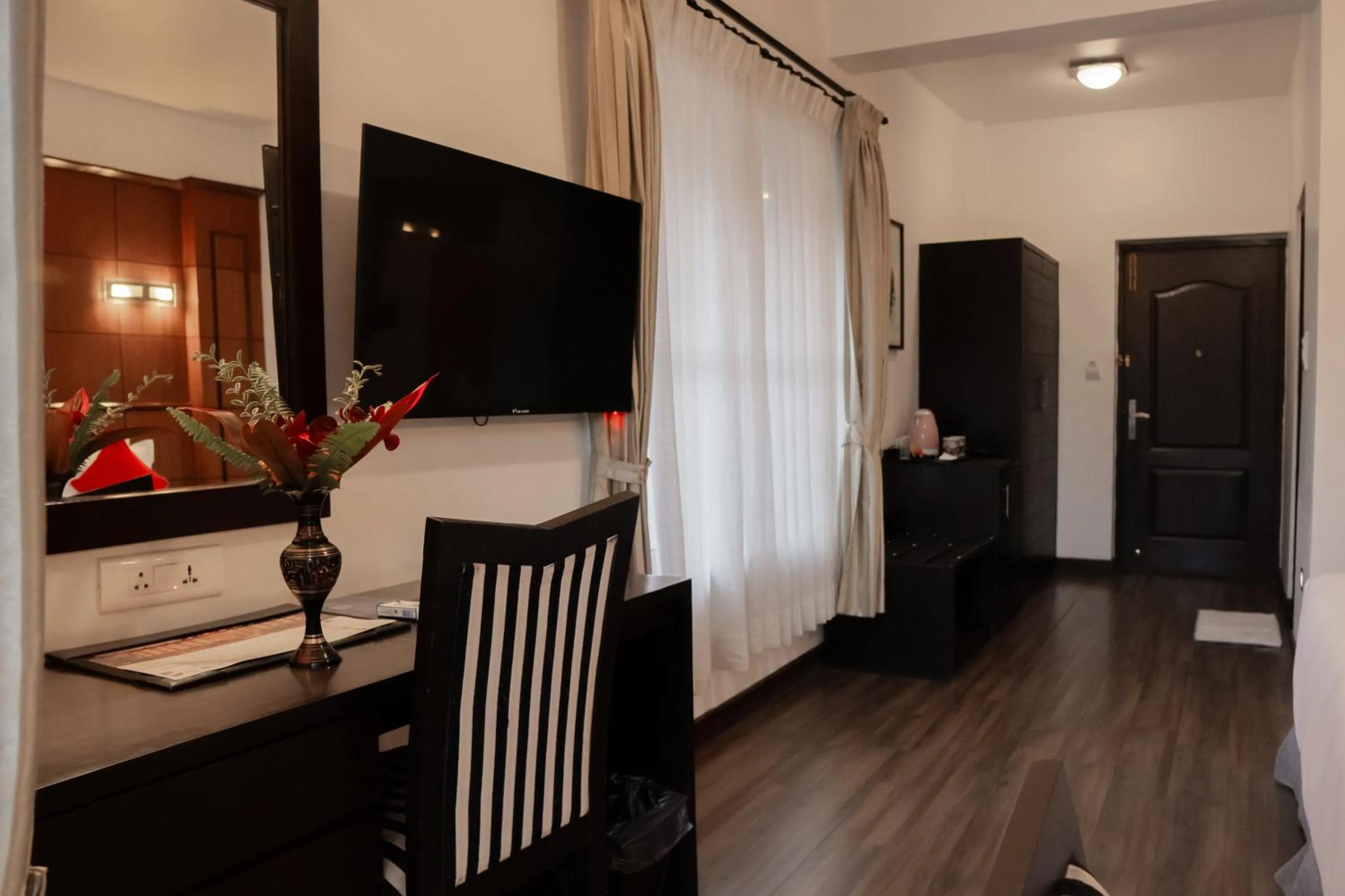 TV and multimedia in Waterfront Resort by KGH Group