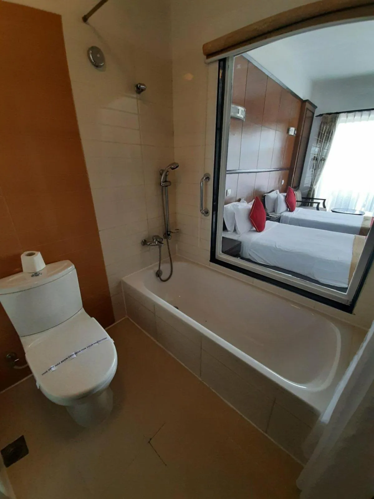 Bathroom, Bed in Waterfront Resort by KGH Group