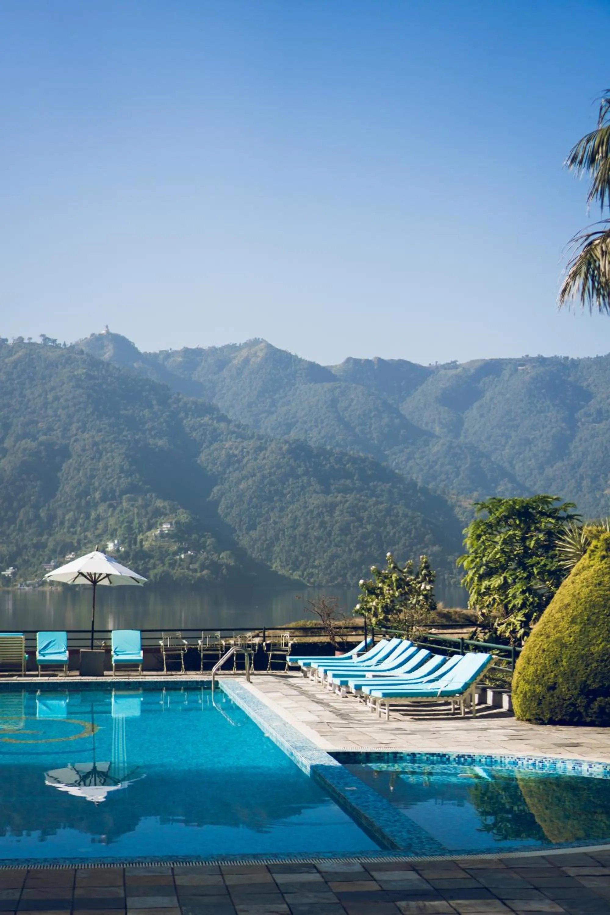 Swimming pool in Waterfront Resort by KGH Group