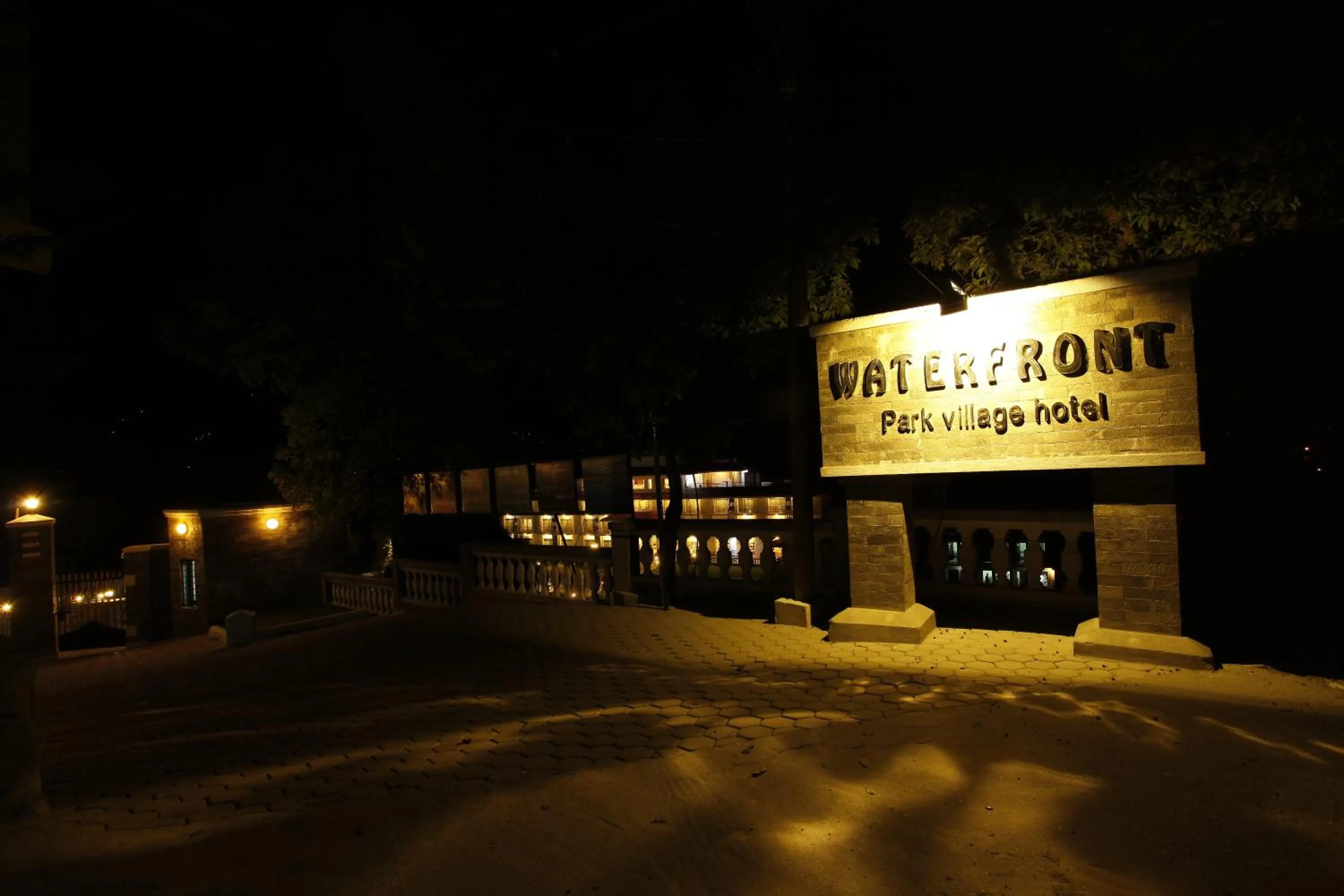 Facade/entrance in Waterfront Resort by KGH Group