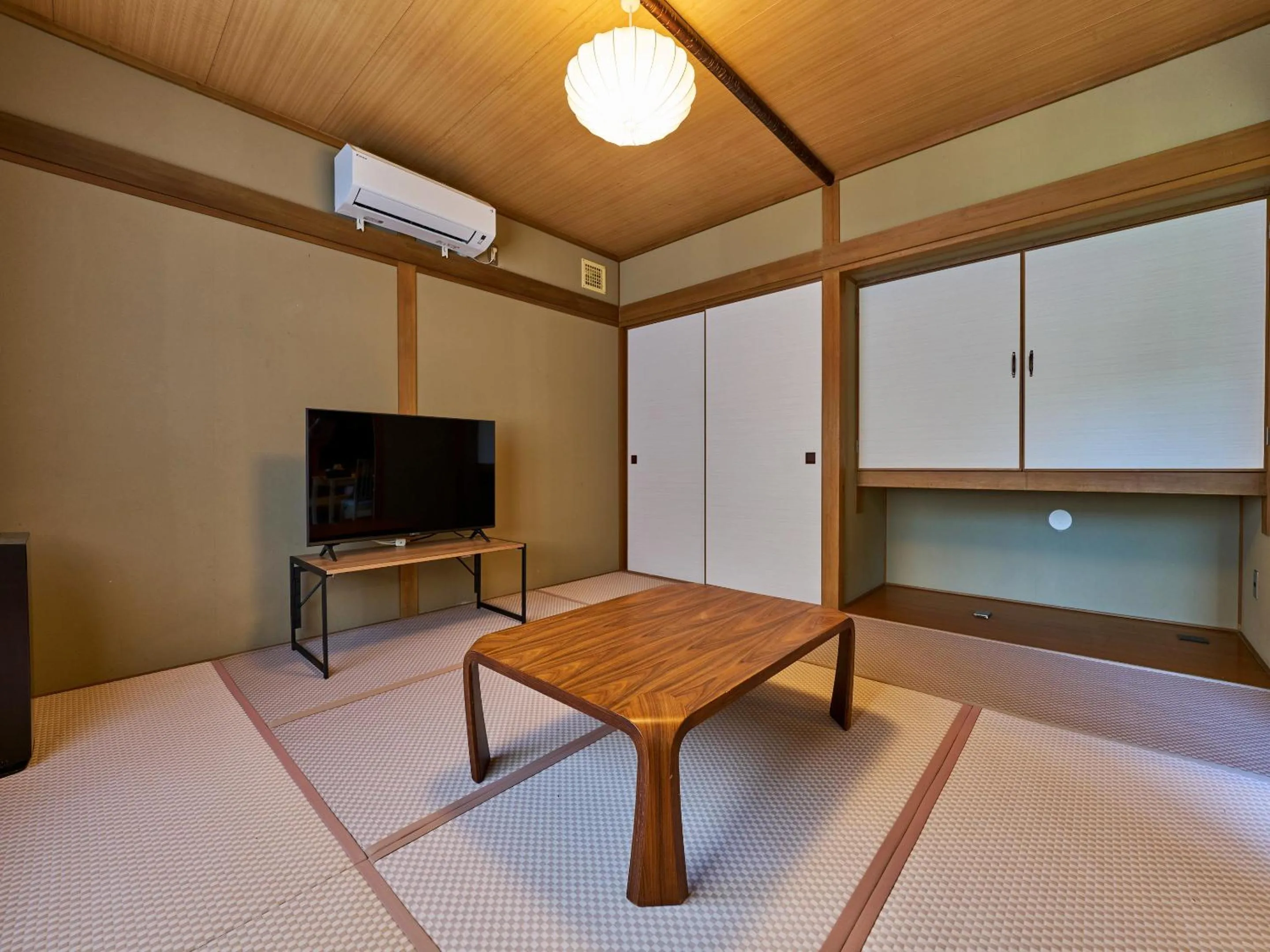 Bed in LiVEMAX RESORT Hakodate Greenpia Onuma