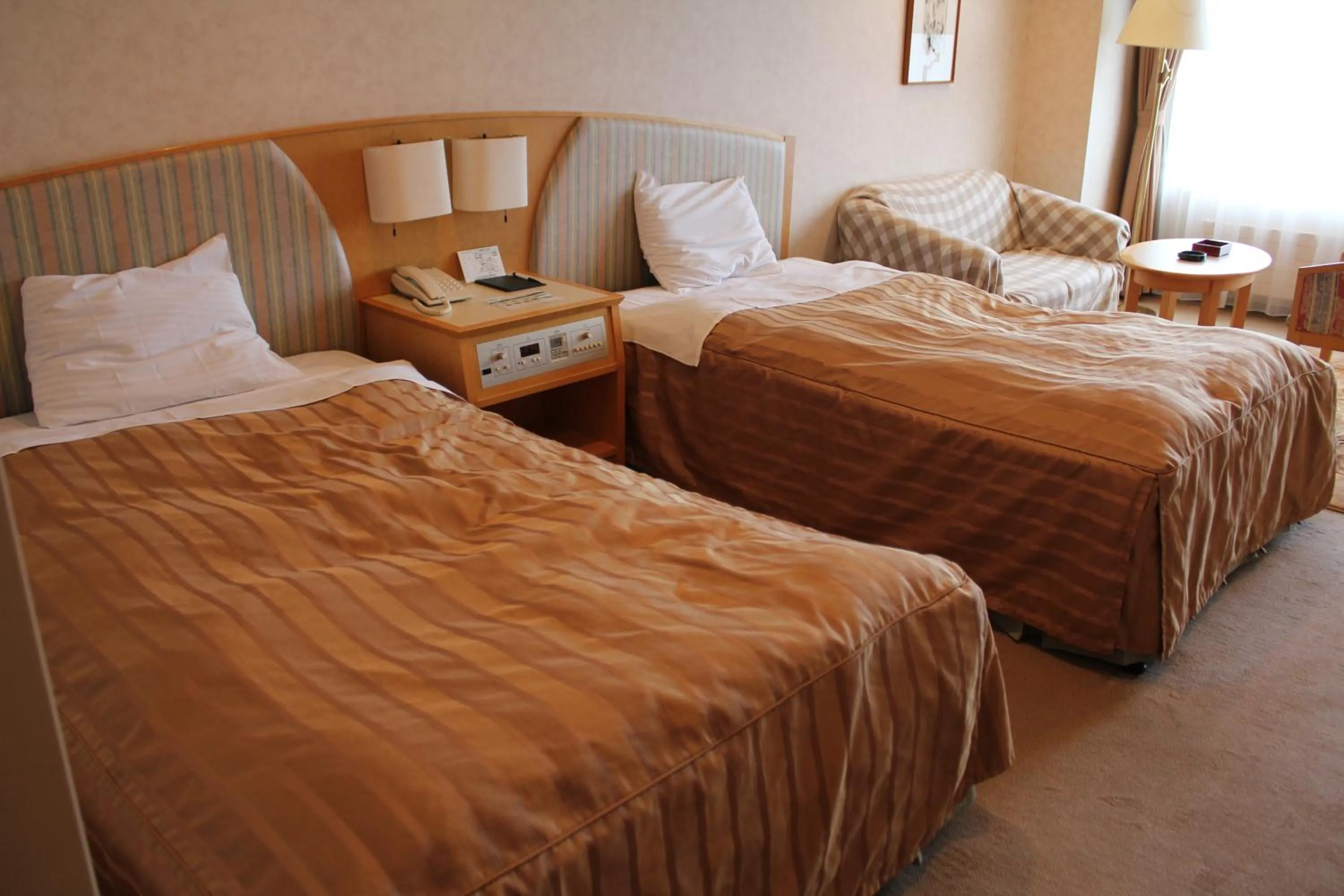 Bed in LiVEMAX RESORT Hakodate Greenpia Onuma