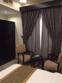 Seating area, Bed in Rukon Buotat 15