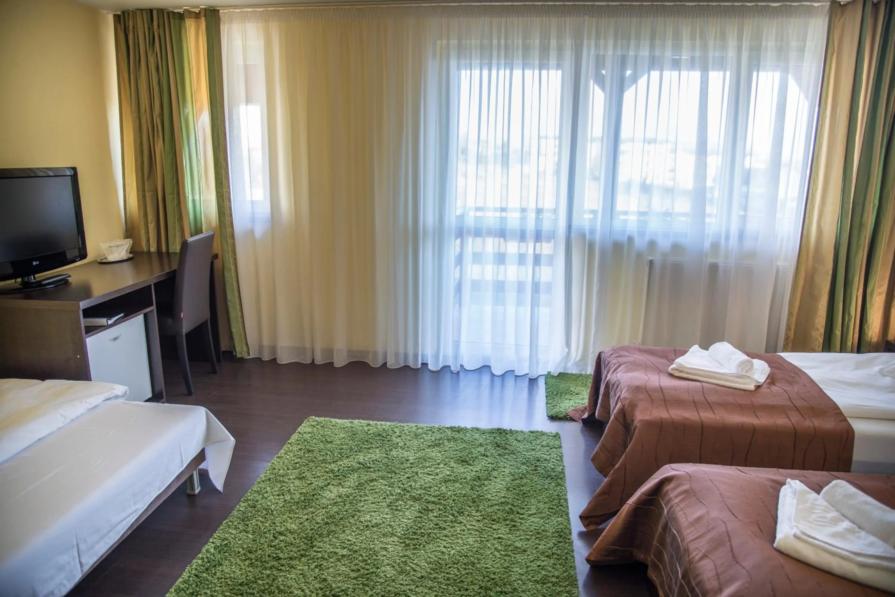 Bed in Pensiunea Carmen - Bikers Friendly Nest