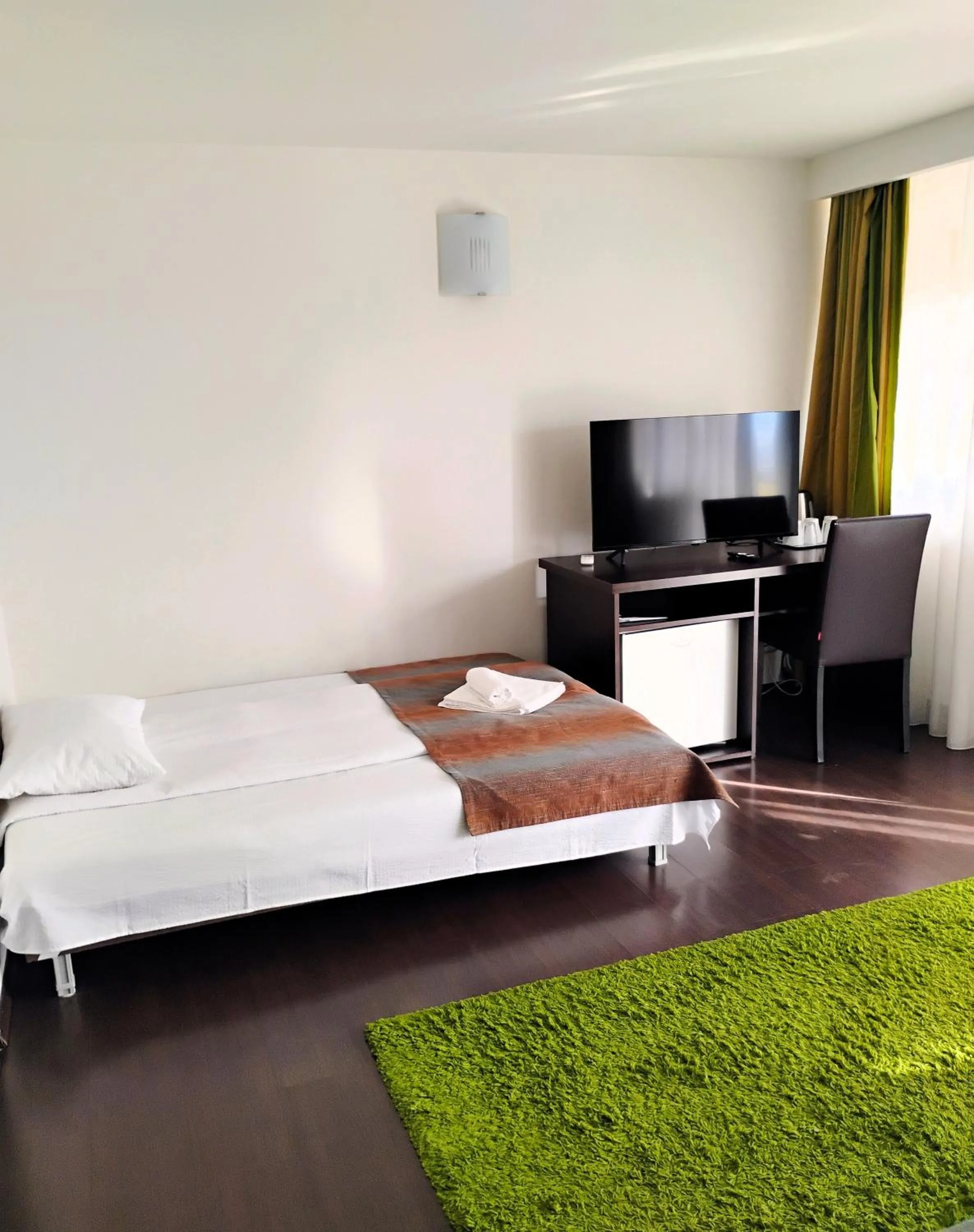 Bed in Pensiunea Carmen - Bikers Friendly Nest