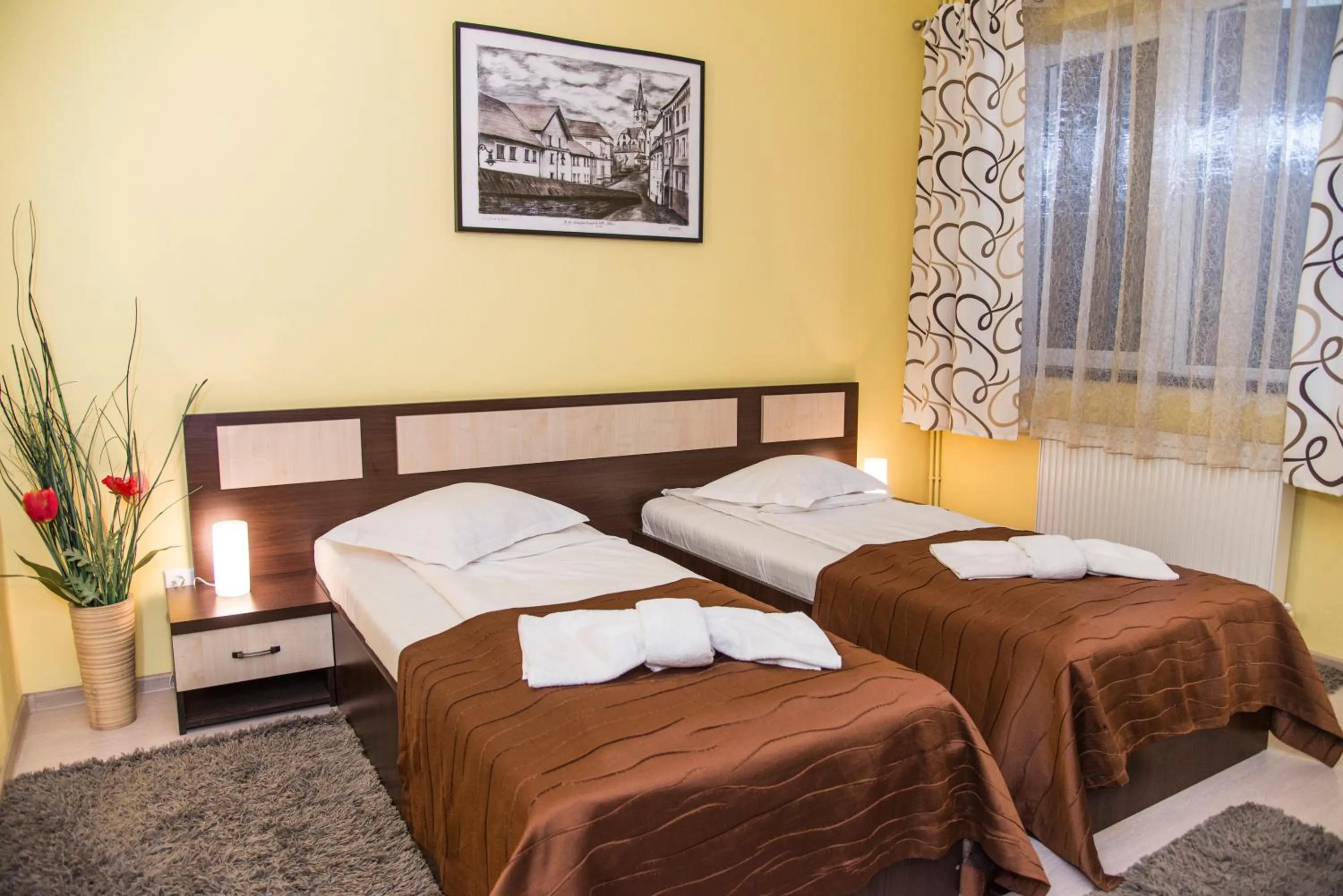 Bedroom in Pensiunea Carmen - Bikers Friendly Nest