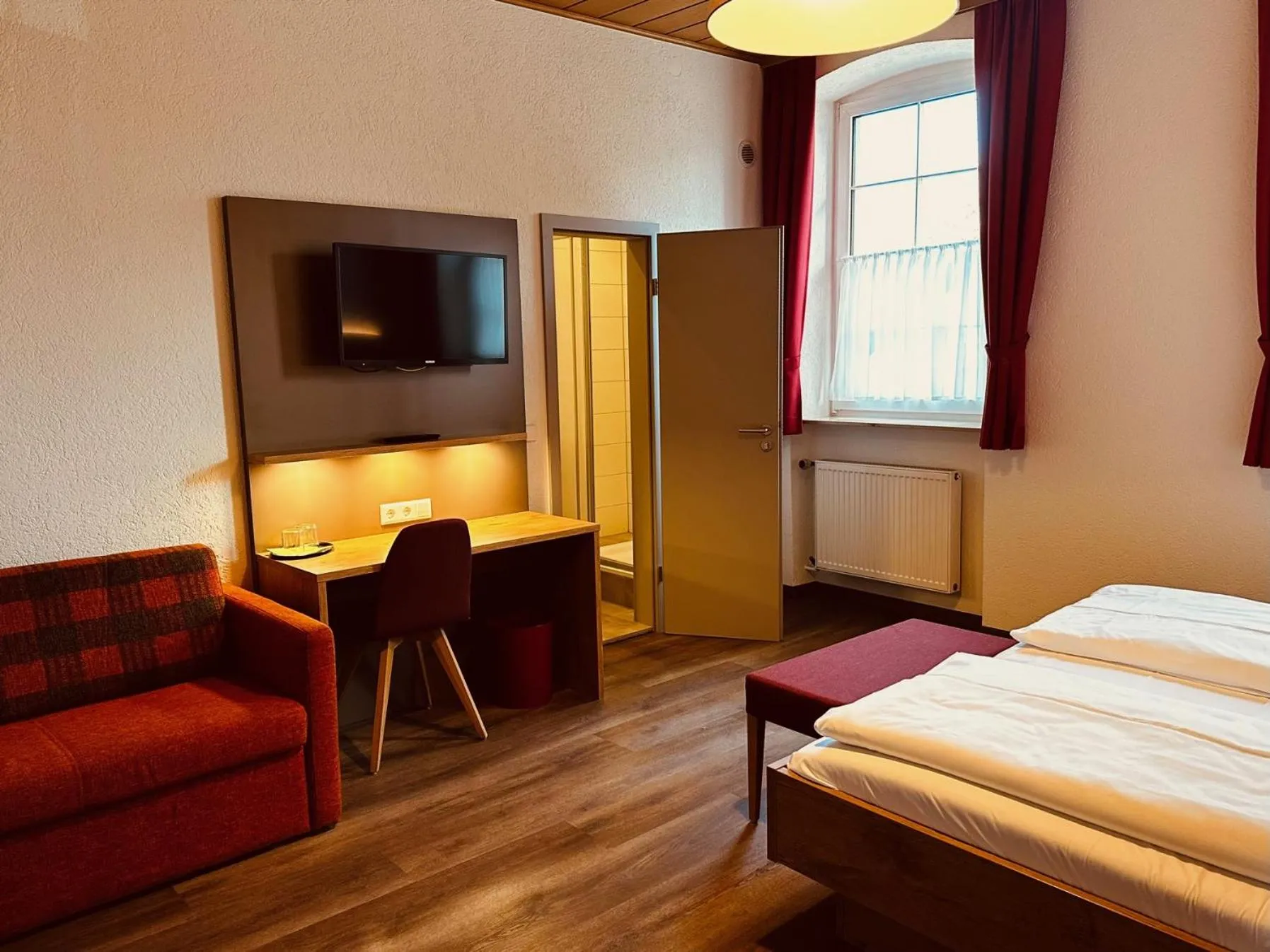 Photo of the whole room, Bed in Hotel und Wirtshaus Löwen
