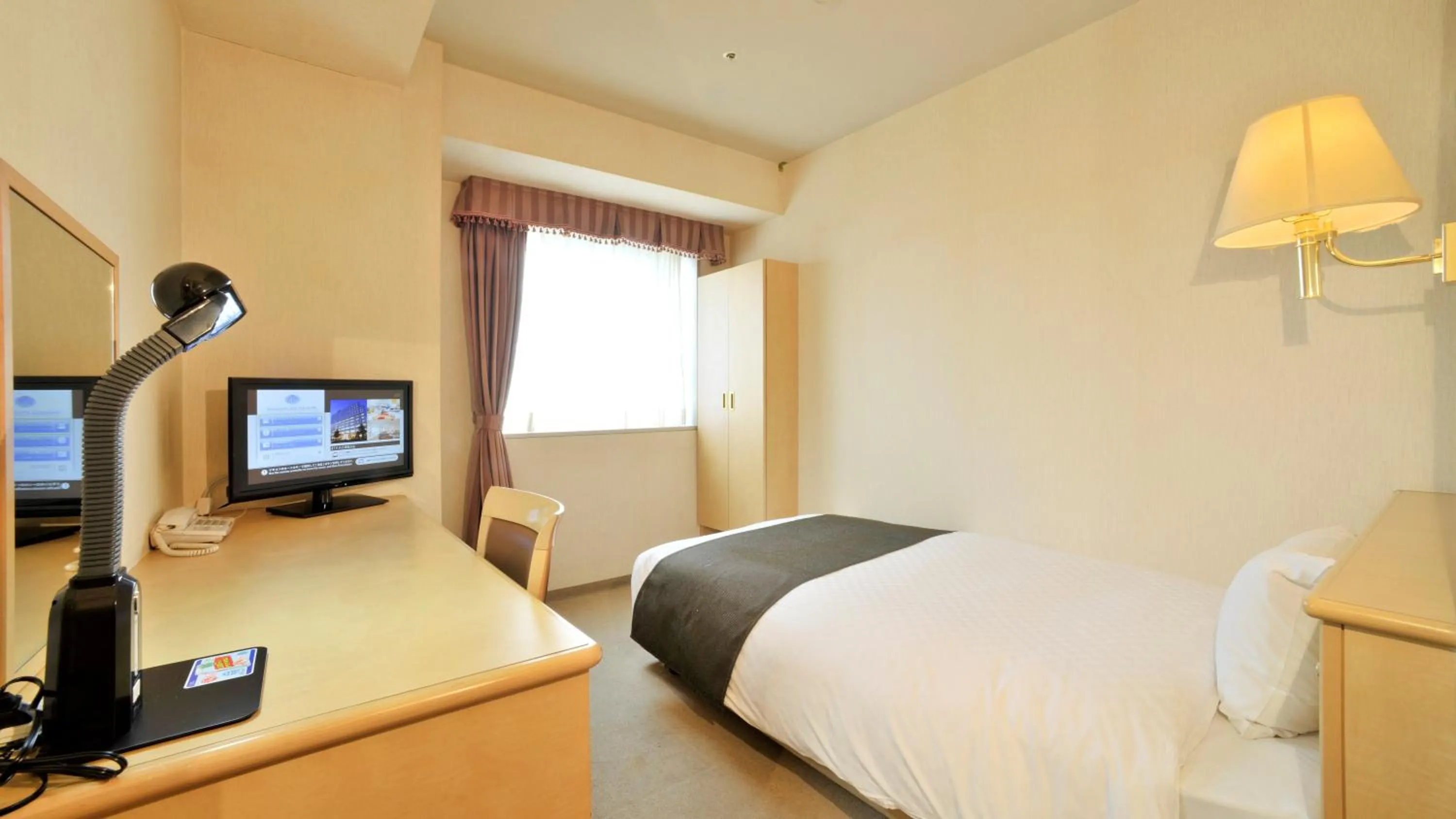 Bed in Yamagata Kokusai Hotel