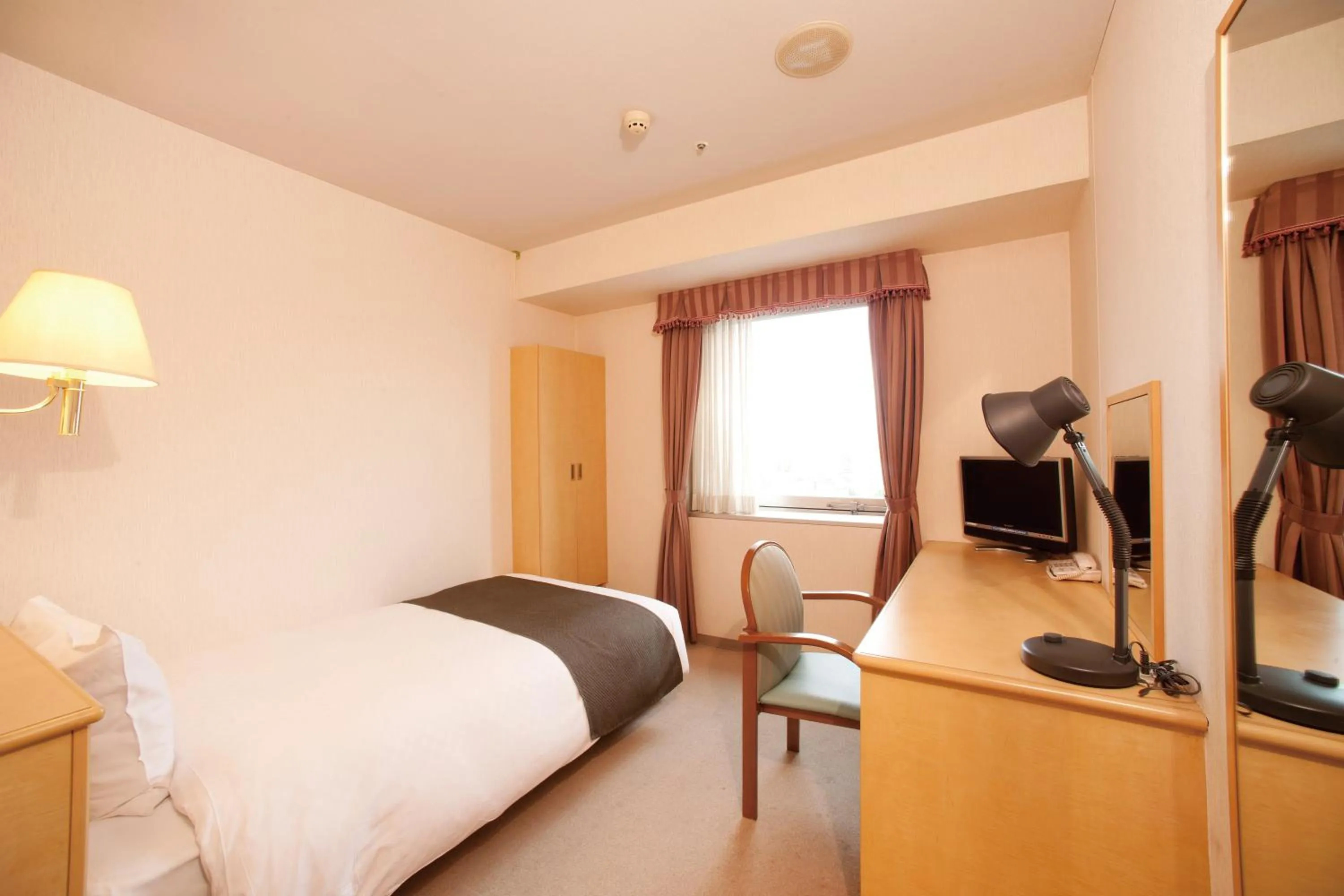 Photo of the whole room, Bed in Yamagata Kokusai Hotel