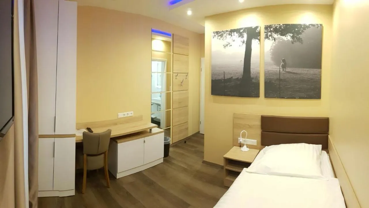 Bed in Hotel Haus Büderich