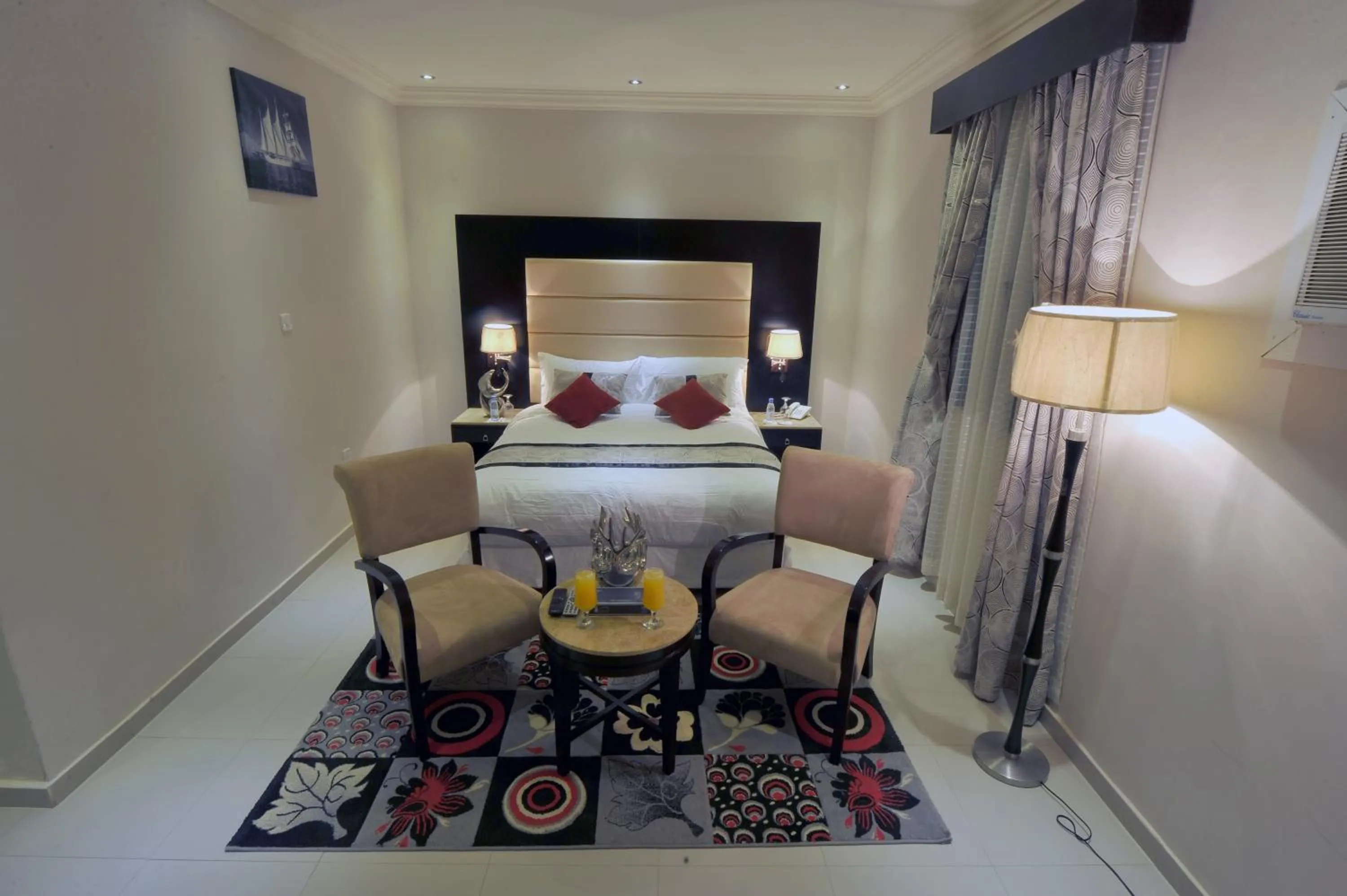 Photo of the whole room, Bed in Al Janaderia Suites 7