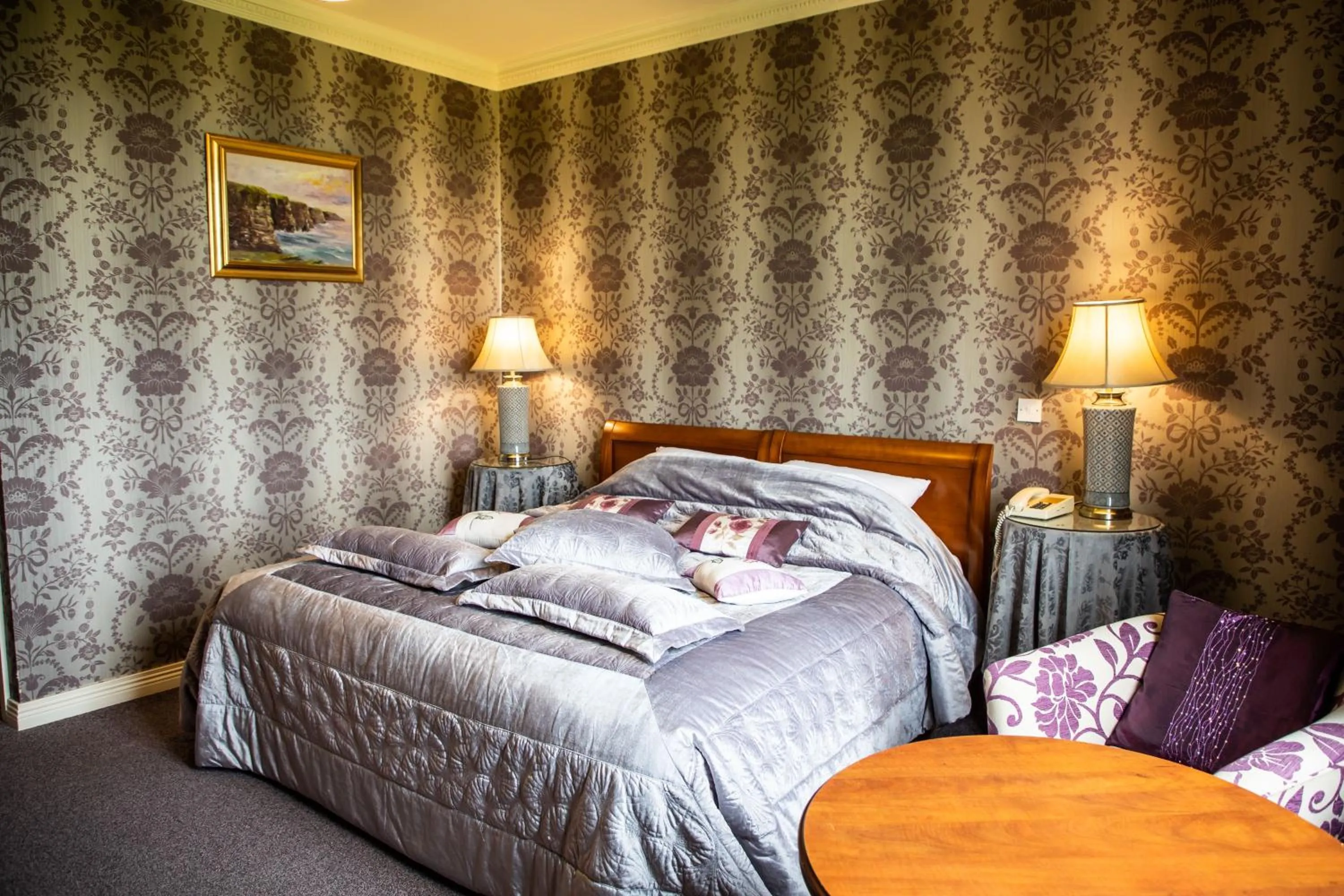 Bed in Ballinalacken Castle Country House Hotel