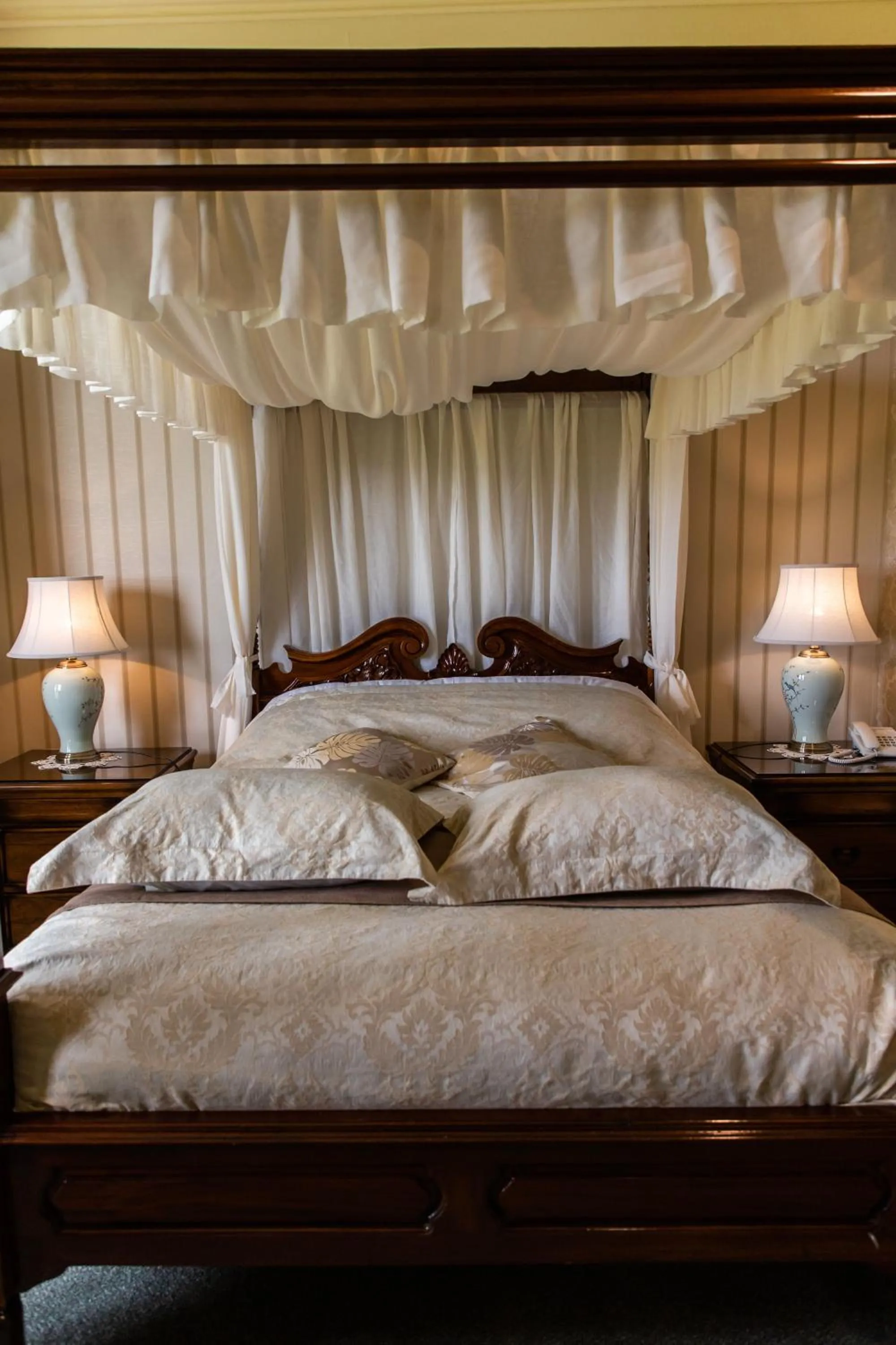 Bed in Ballinalacken Castle Country House Hotel