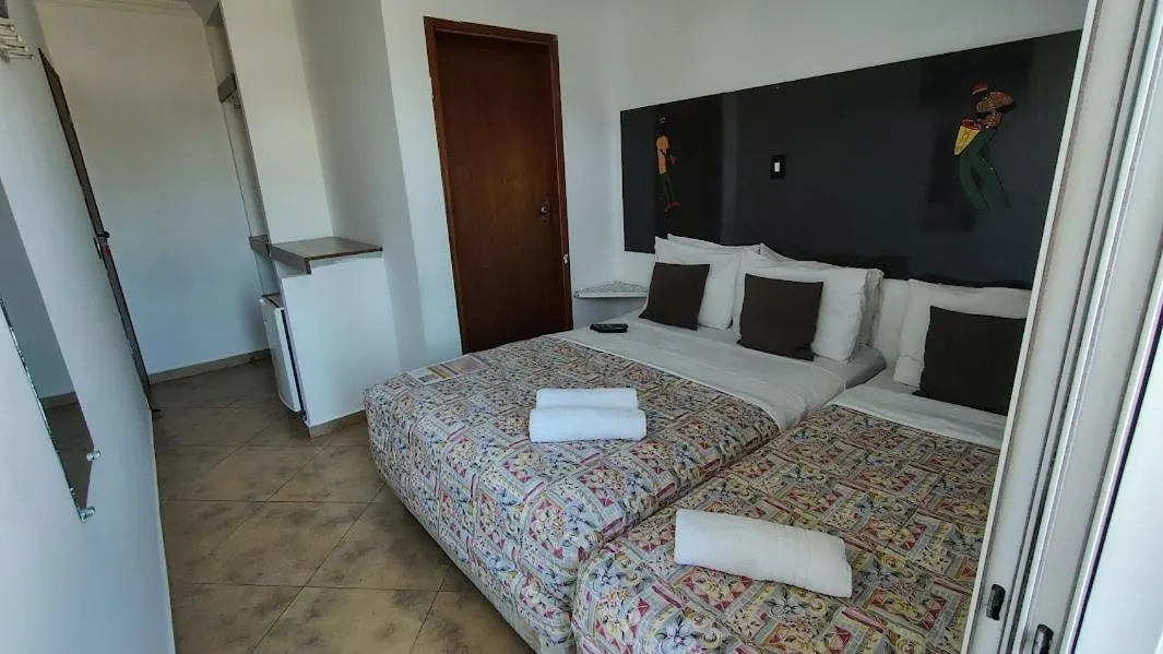 Photo of the whole room, Bed in Hotel Pousada Iracemar - Piscina Aquecida