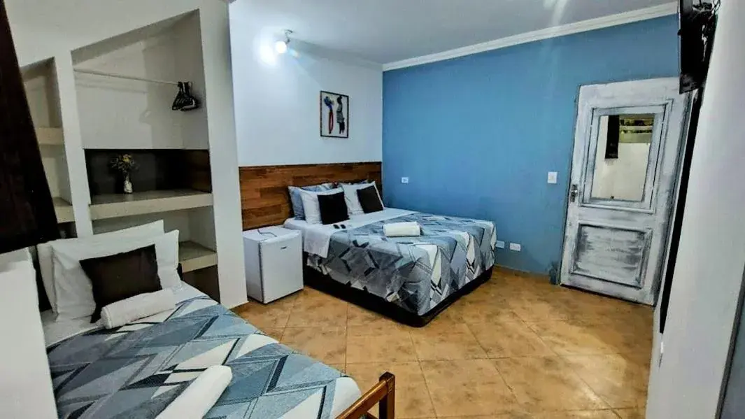 Comfort Triple Room in Hotel Pousada Iracemar - Piscina Aquecida Comfort Triple Room in Hotel Pousada Iracemar - Piscina Aquecida