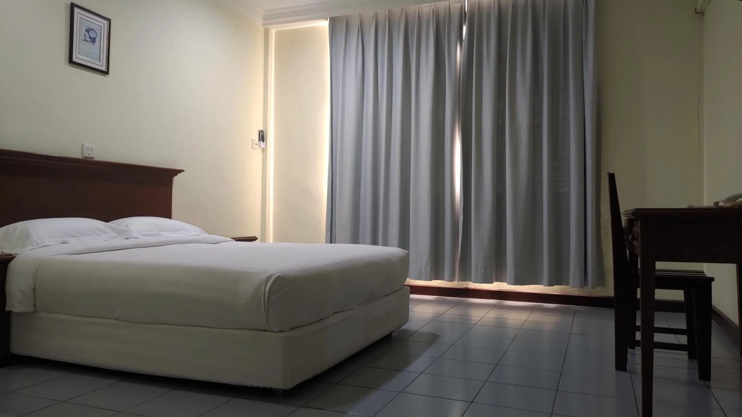 Bed in The Upper Deck Hotel