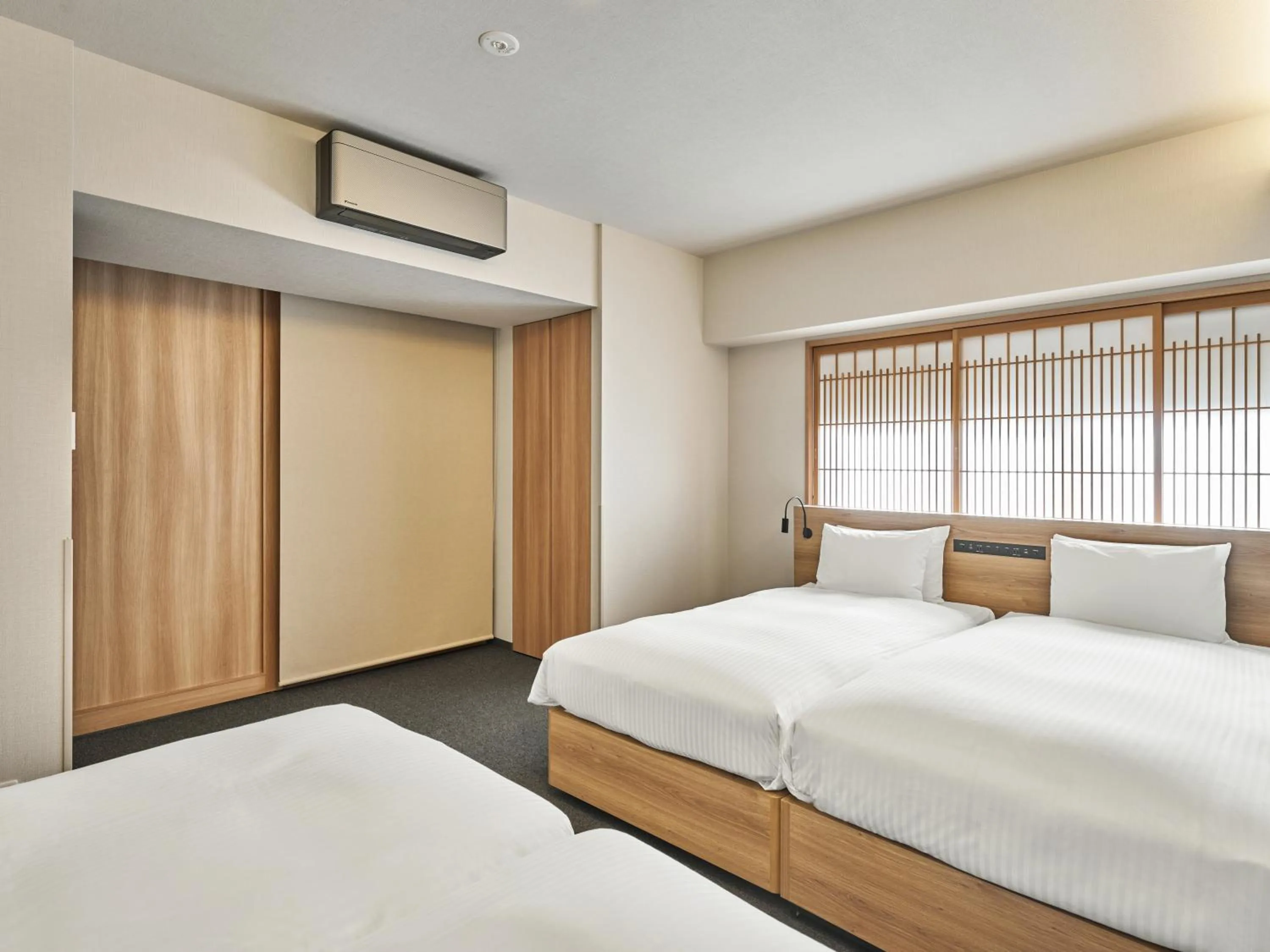 Bed in MIMARU Kyoto Nishinotoin Takatsuji