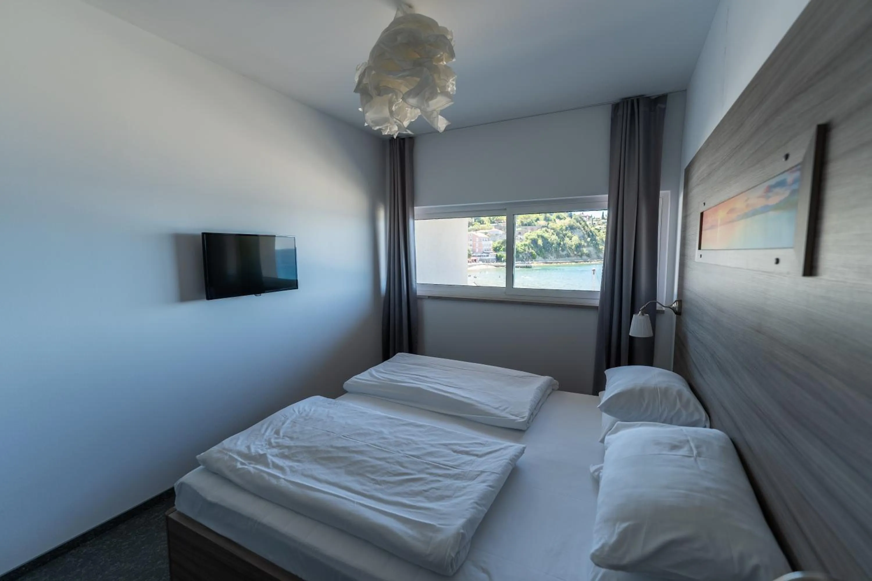 Bed in Barbara Piran Beach Hotel