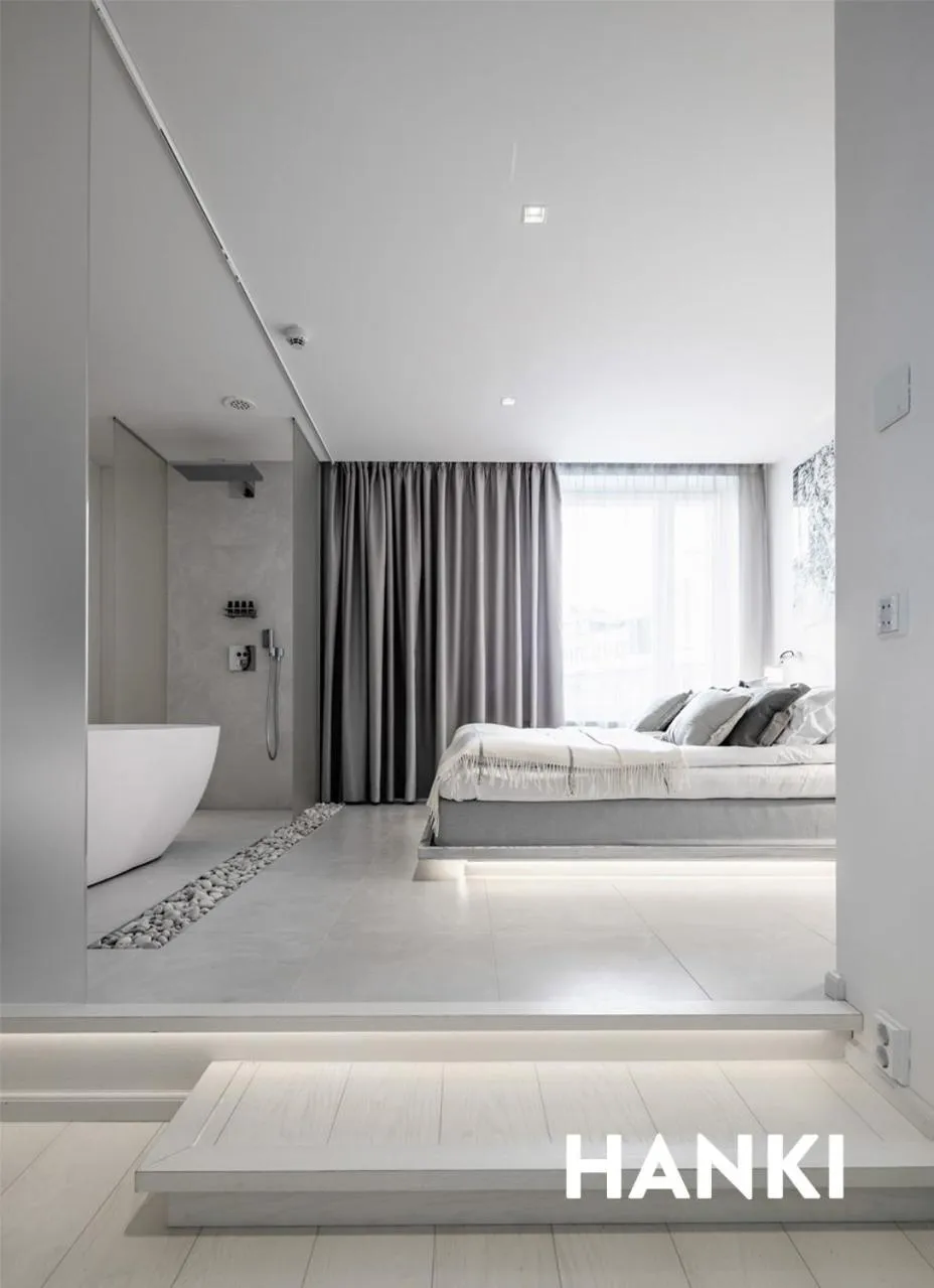 Bed in HAAWE Boutique Apart Hotel