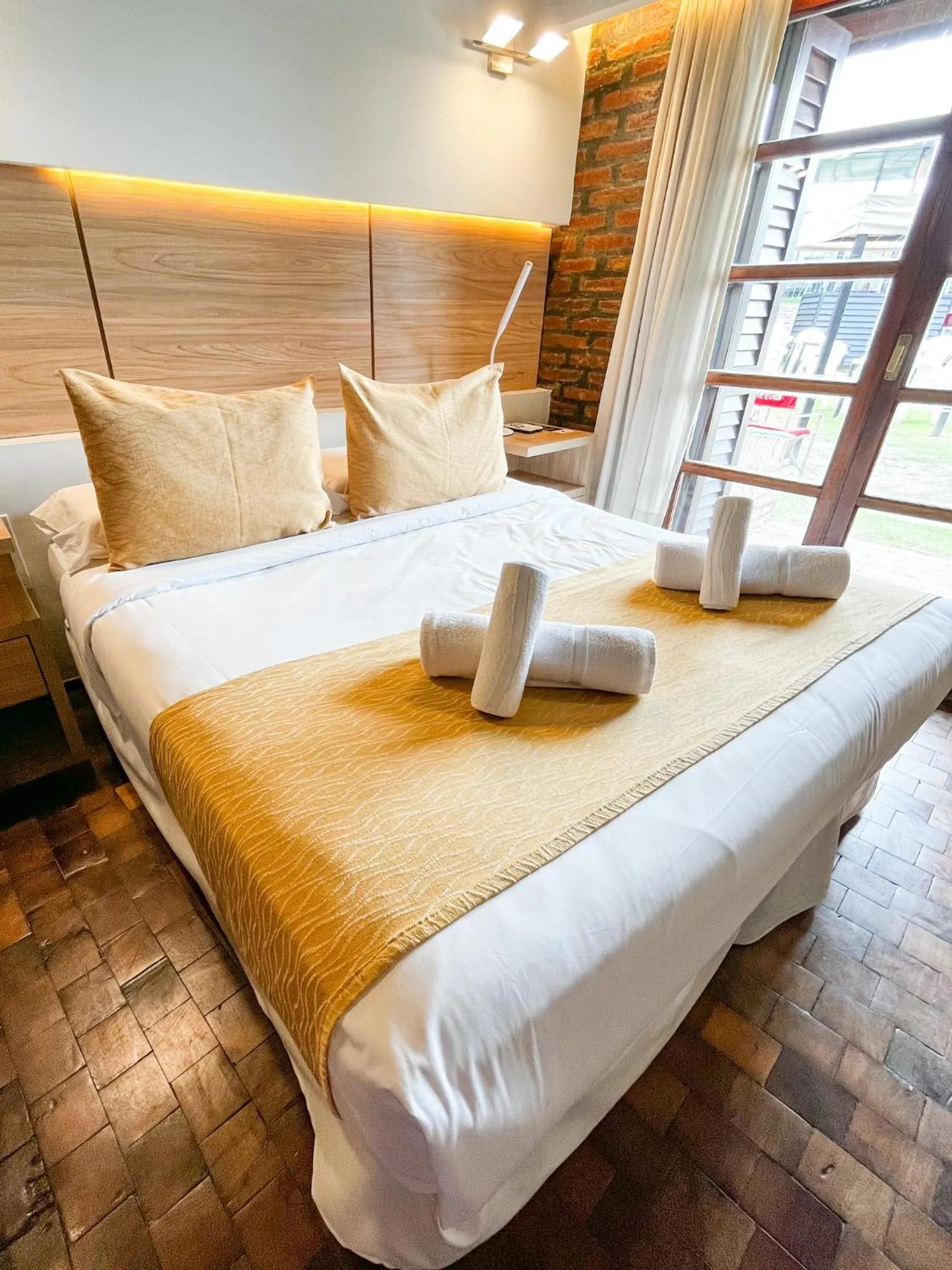 Bed in Portal del Lago Hotel