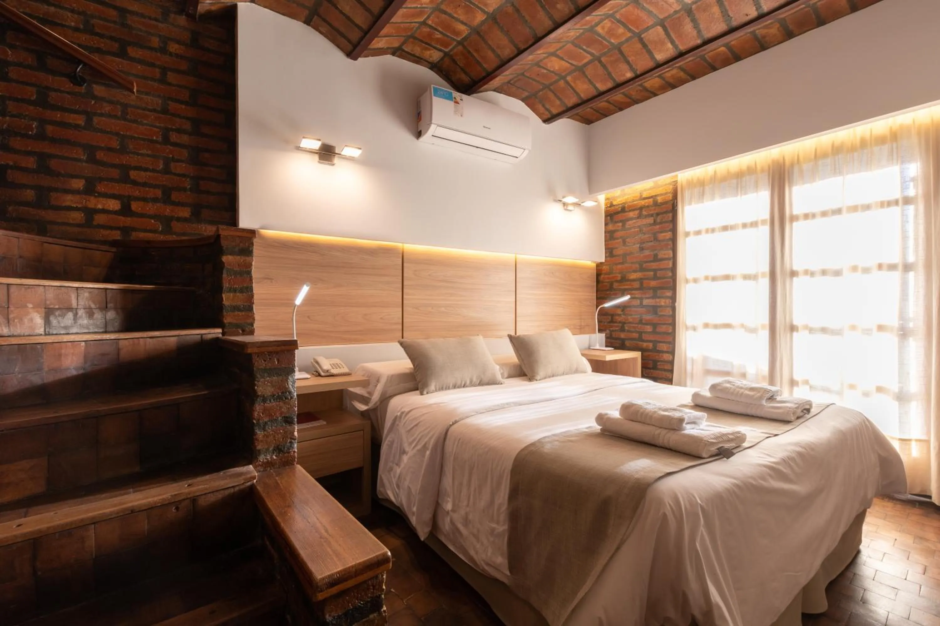 Bedroom, Bed in Portal del Lago Hotel