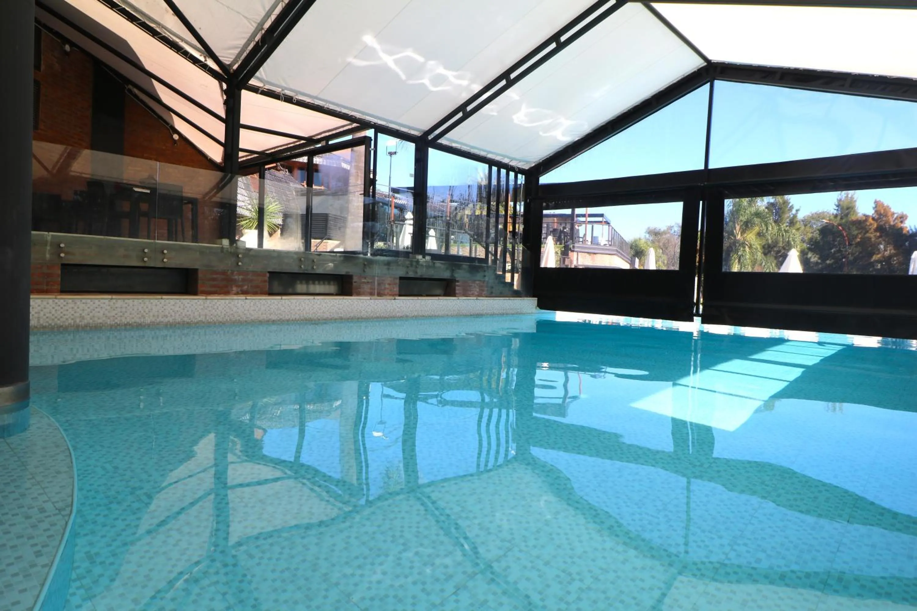 Swimming pool in Portal del Lago Hotel