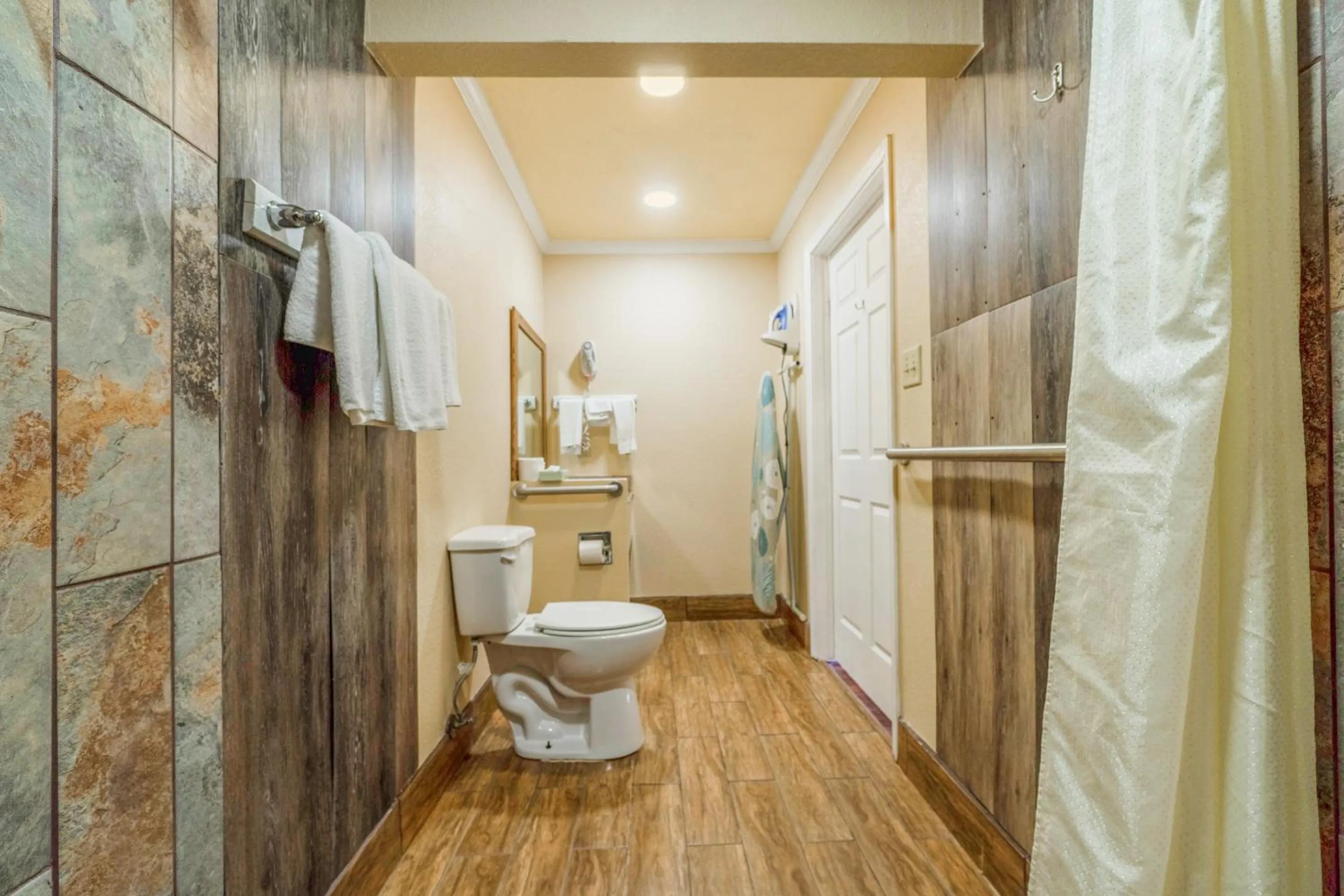 Bathroom in River Valley Motor Inn By OYO La Grange Texas