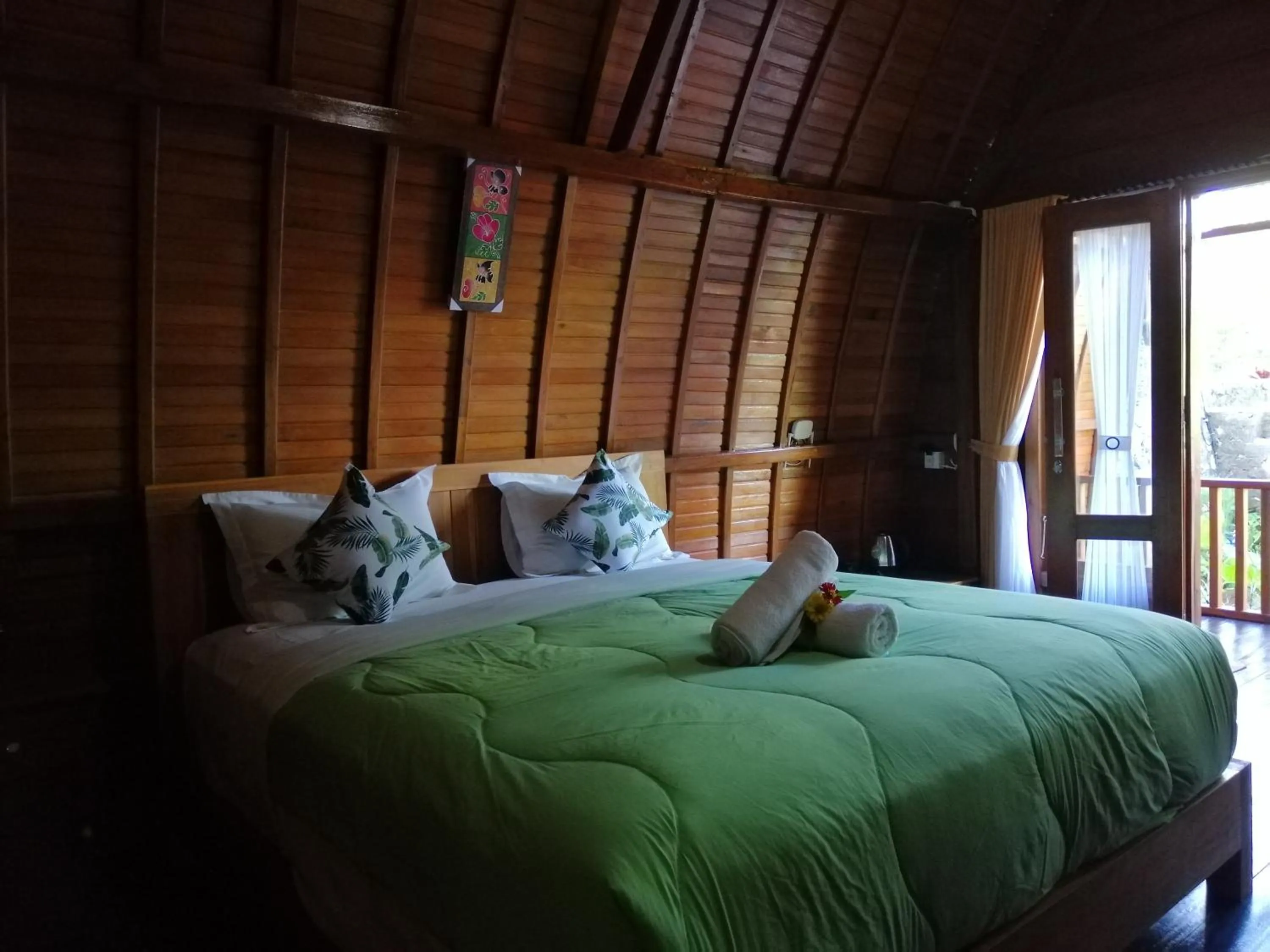 Bed in Ginanthi Cottage