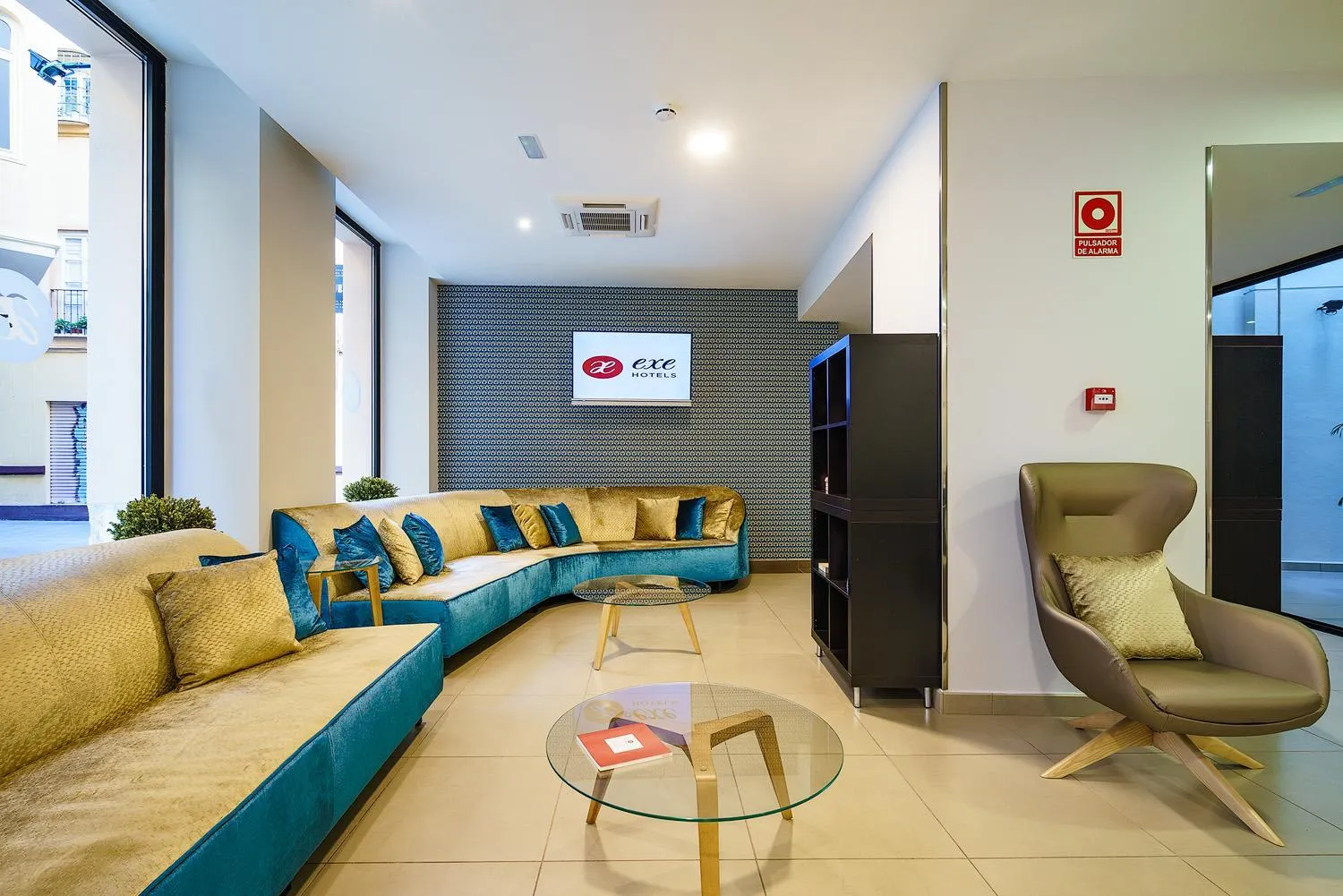 Communal lounge/ TV room in Exe Málaga Museos