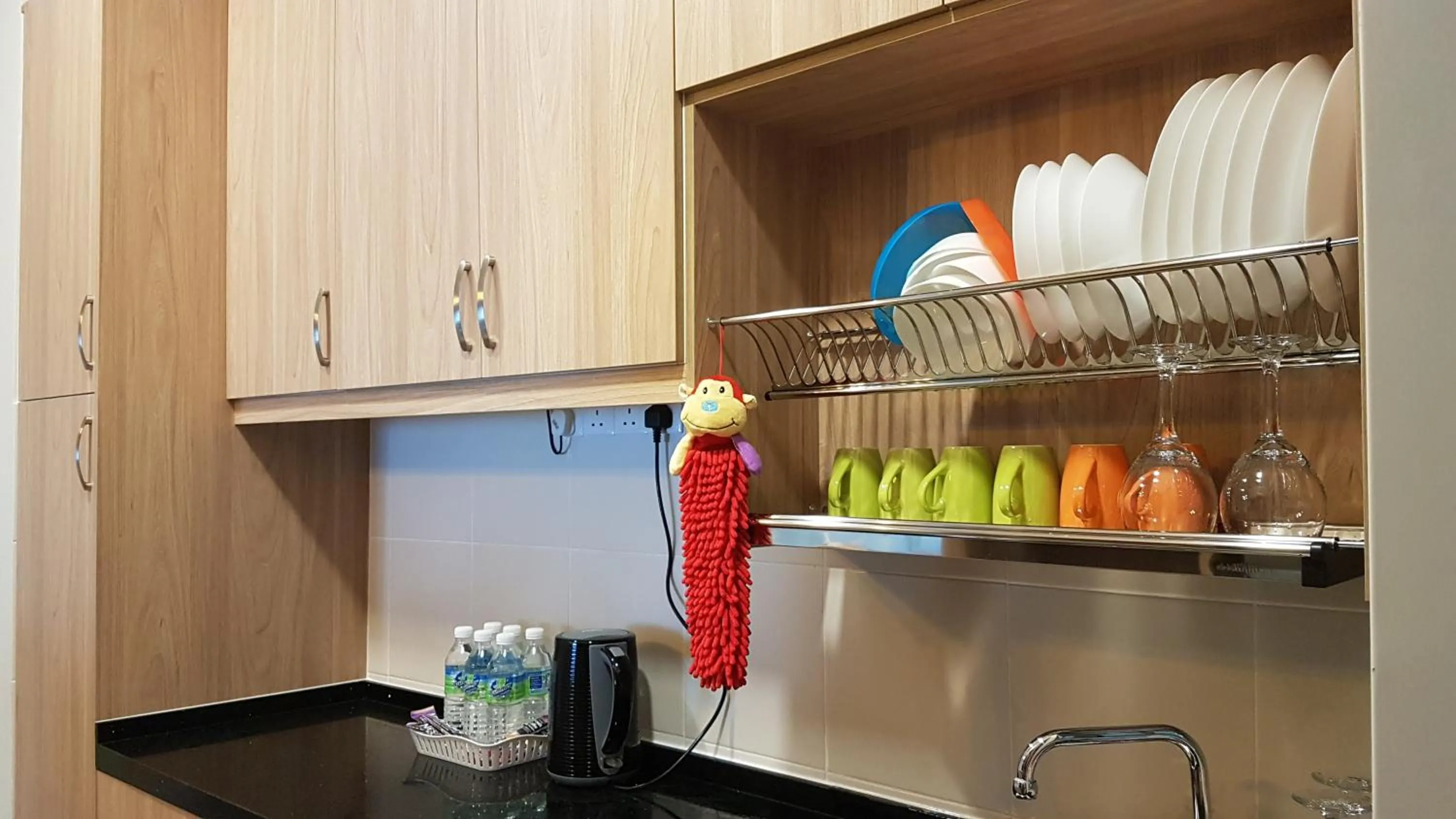 Kitchen or kitchenette in Southville Stay @ Savanna Executive Suite