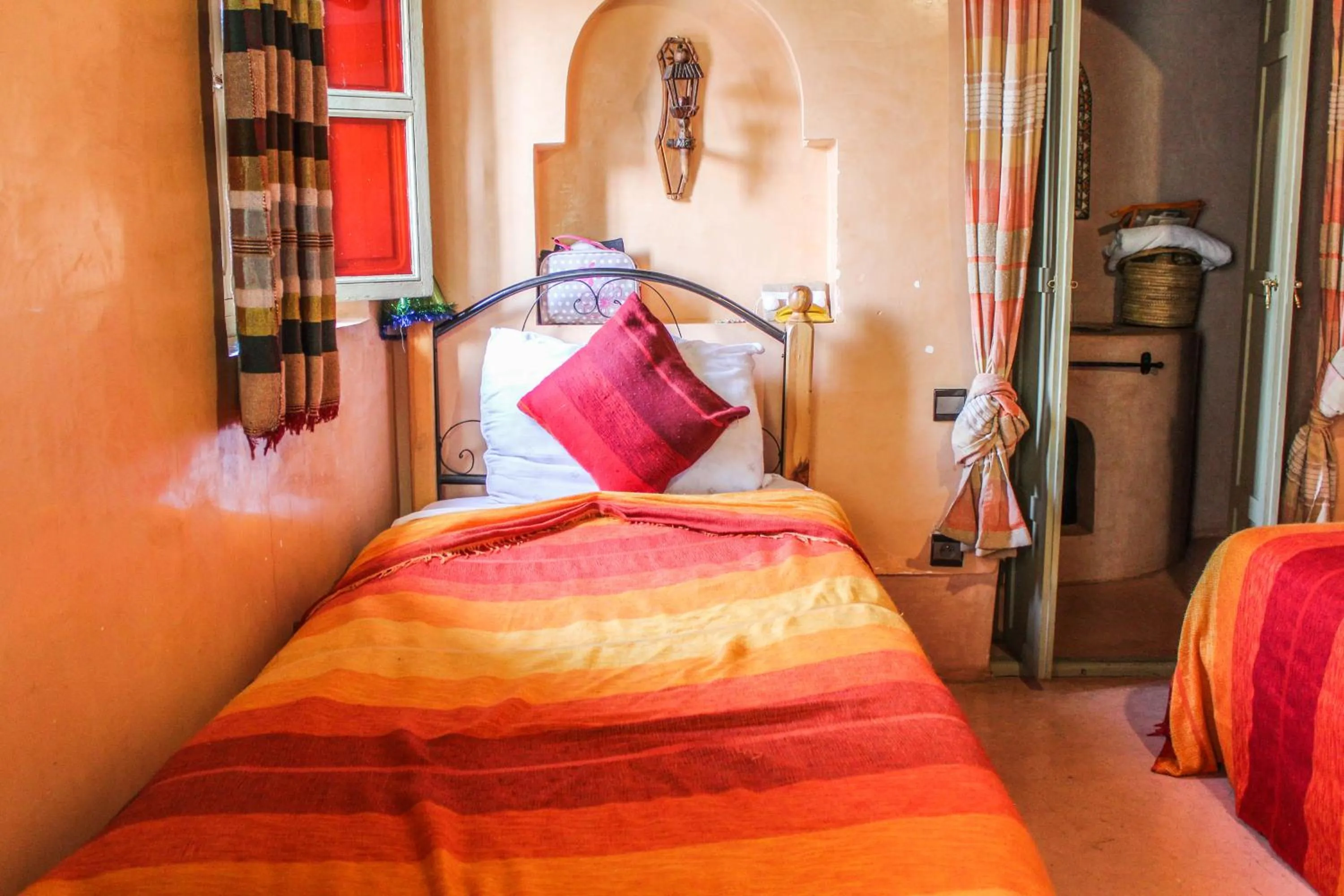 Bed in Riad Minorisa