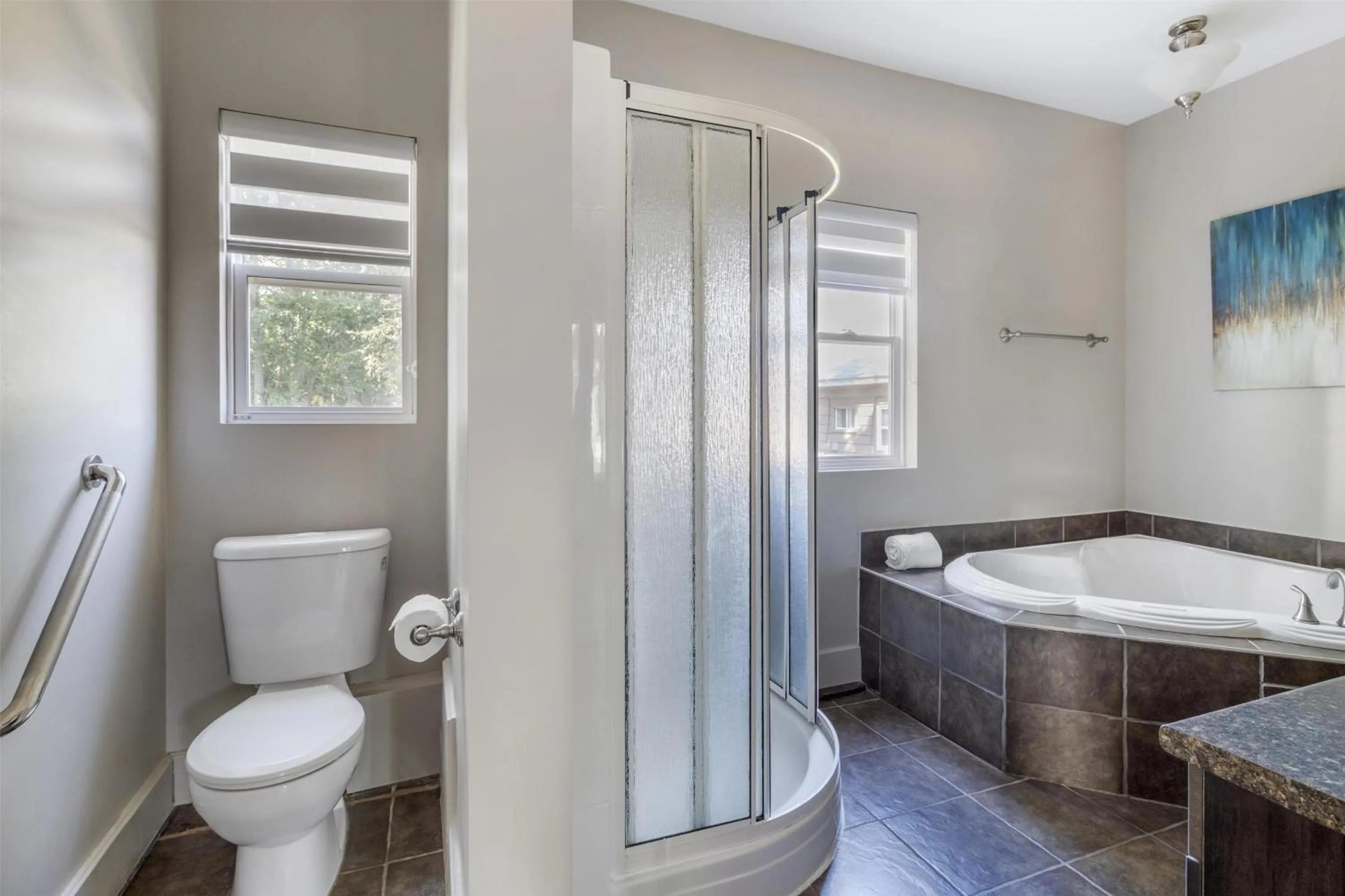 Bathroom in Dannys Suites, SureStay Collection by Best Western