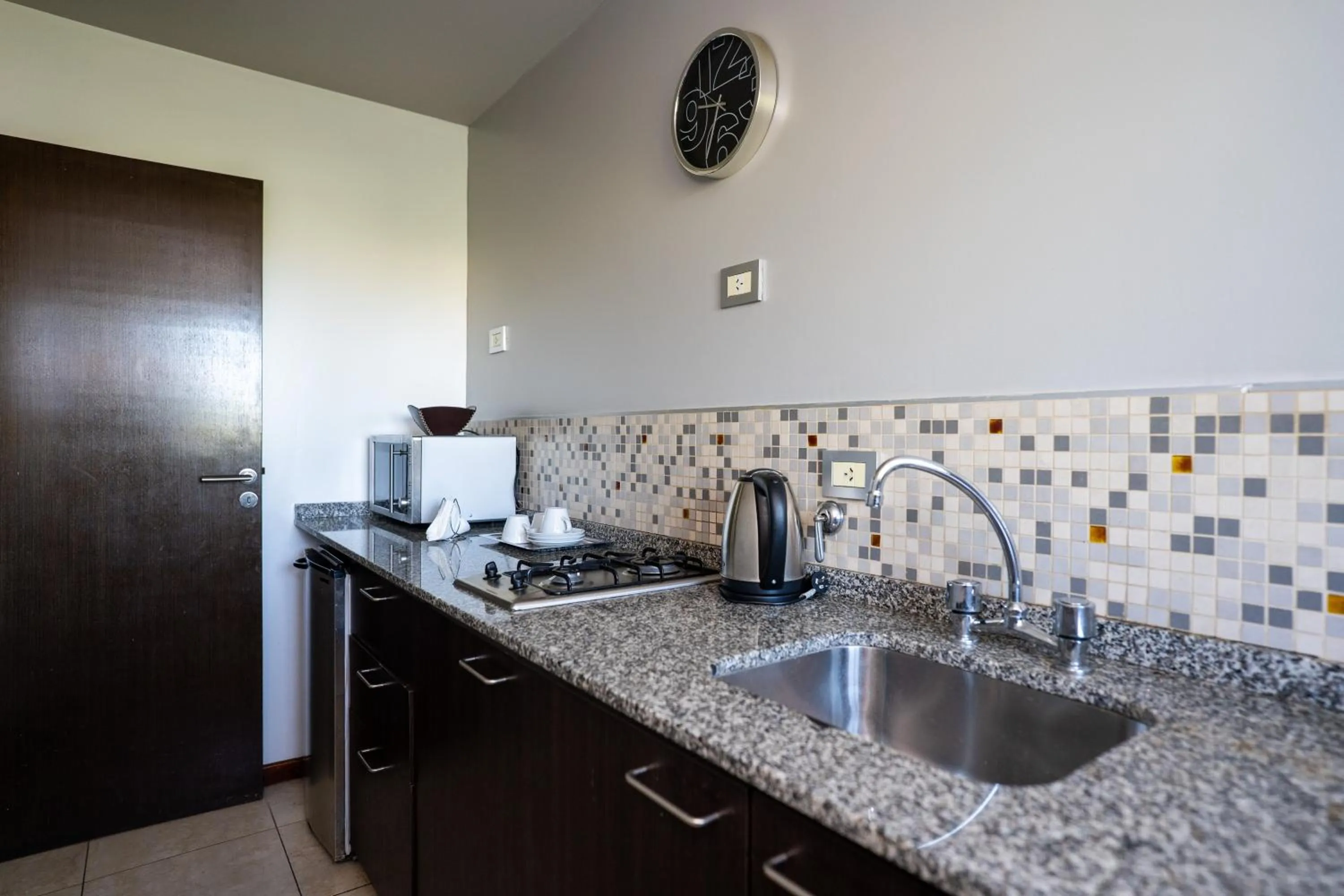 Kitchen or kitchenette in Kube Apartments Express