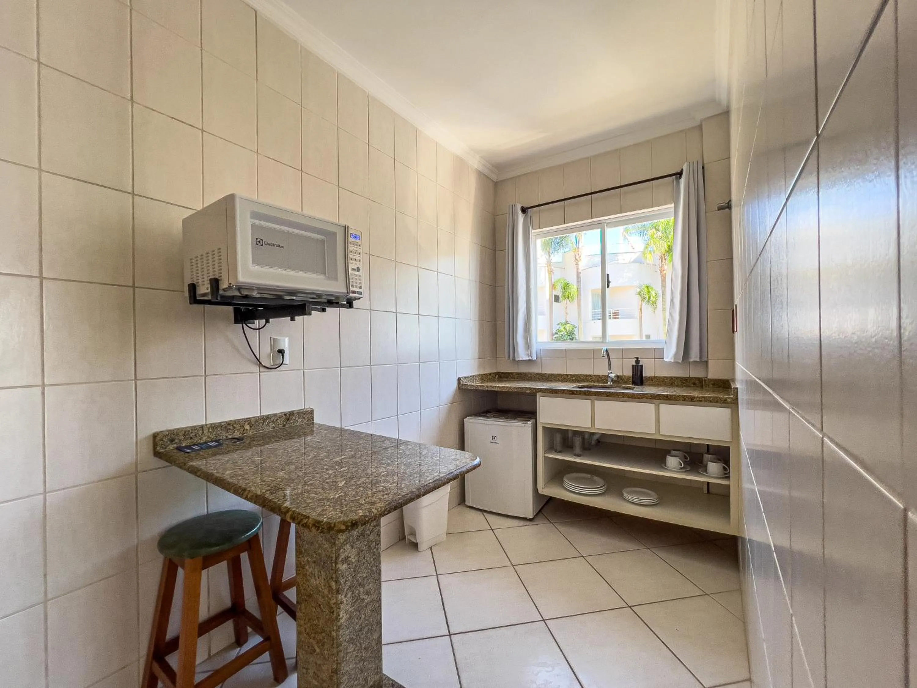 Kitchen or kitchenette in Pousada Garatéia