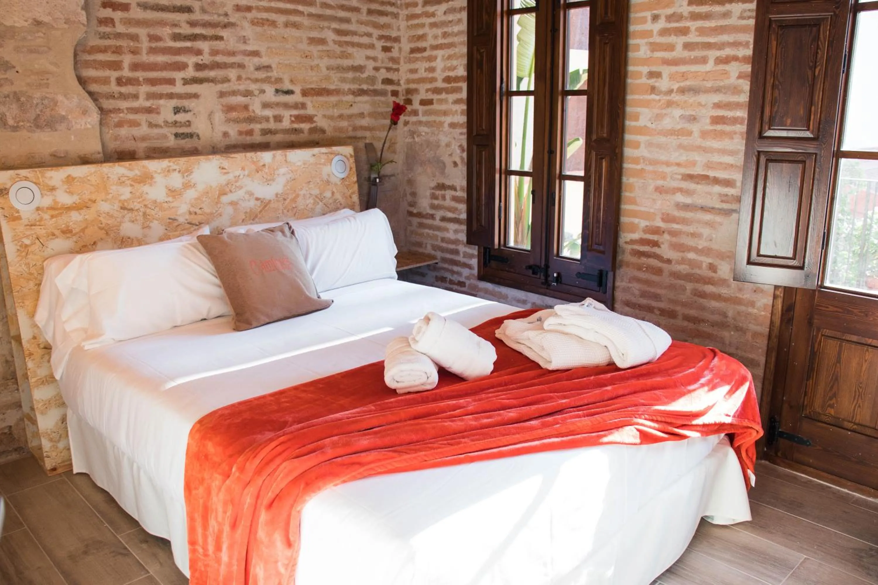 Bed in Àmfores Boutique Guest House